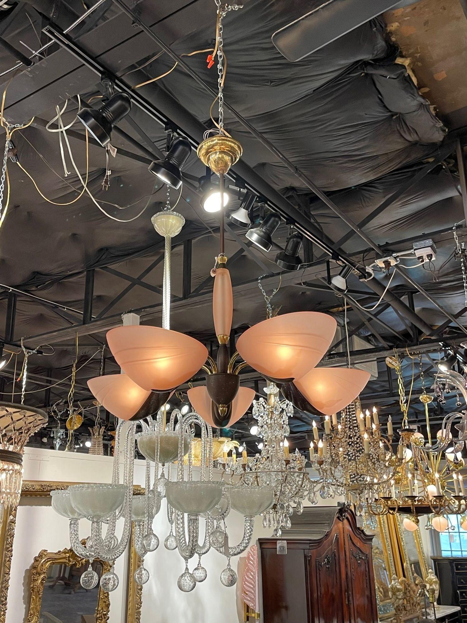 Very unique vintage blush Murano glass and brass 5 light chandelier. Creates a very modern look! Very nice!