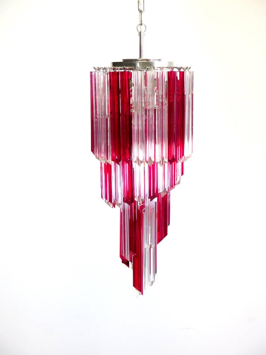 Fantastic and big Murano chandelier made by 54 Murano crystal prism (quadriedri) in a chrome metal frame. The shape of this chandelier is spiral. Glasses with two different colors, ruby red and transparent.
Period: 1980s-1990s
Dimensions: 59