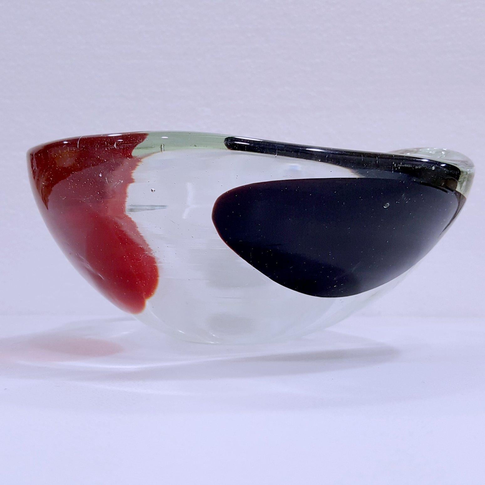 Vintage Murano Glass A Macchia Bowl (Fratelli Toso suspected) 
(See also our companion listing to this item -- a large centerpiece tray.)

This is a larger, heavier clear glass with three large color spots (black, white, and red). There are numerous