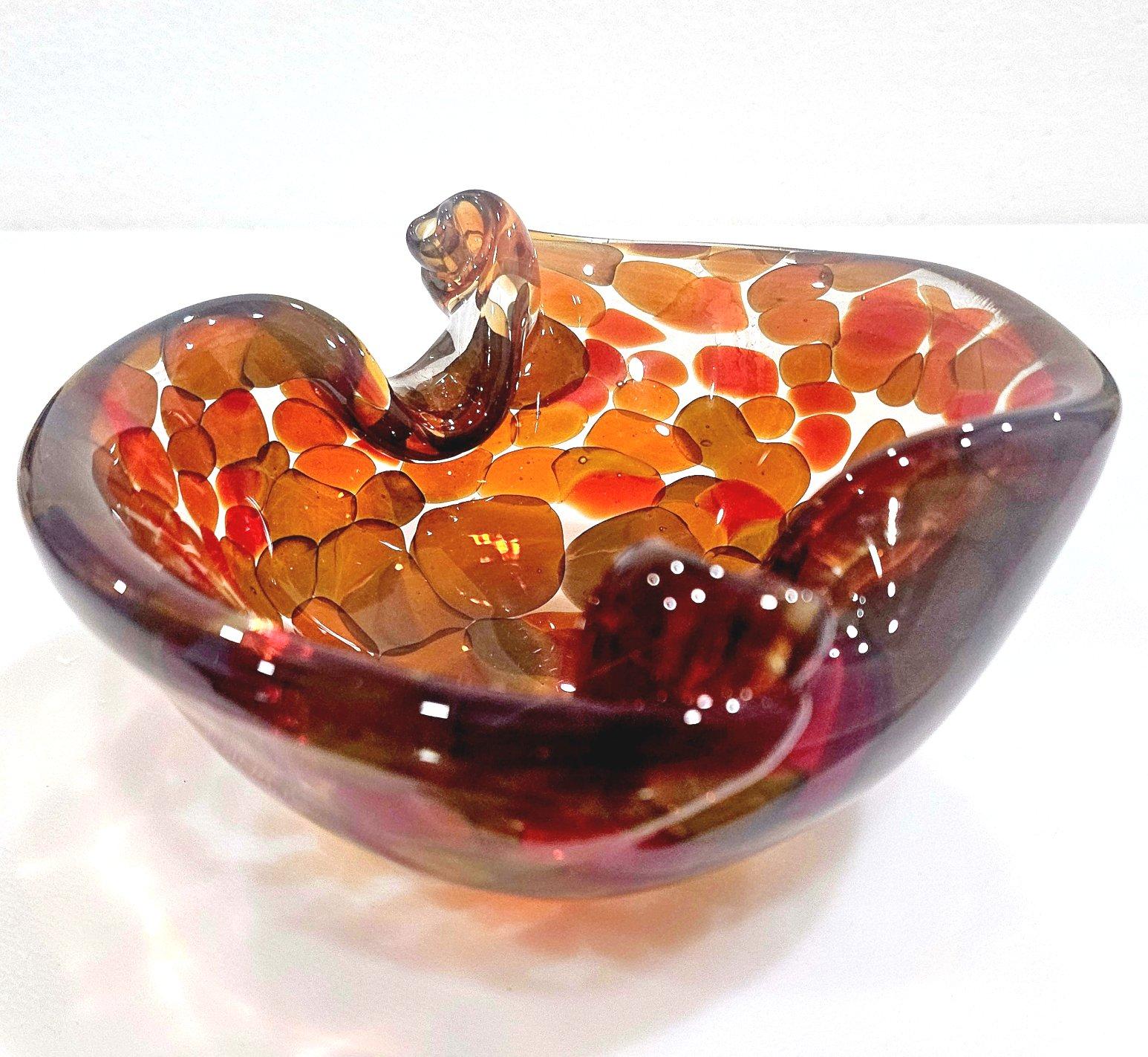 Vintage Murano Glass a Pentoni (spots) Bowl, Shell Motif
Measures: approximately 6 x 5 x 2.25  inches.
The 'a pentoni' spots appearing in earthy jewel tones, depending on environment and lighting, make this piece really special.  This is one of our