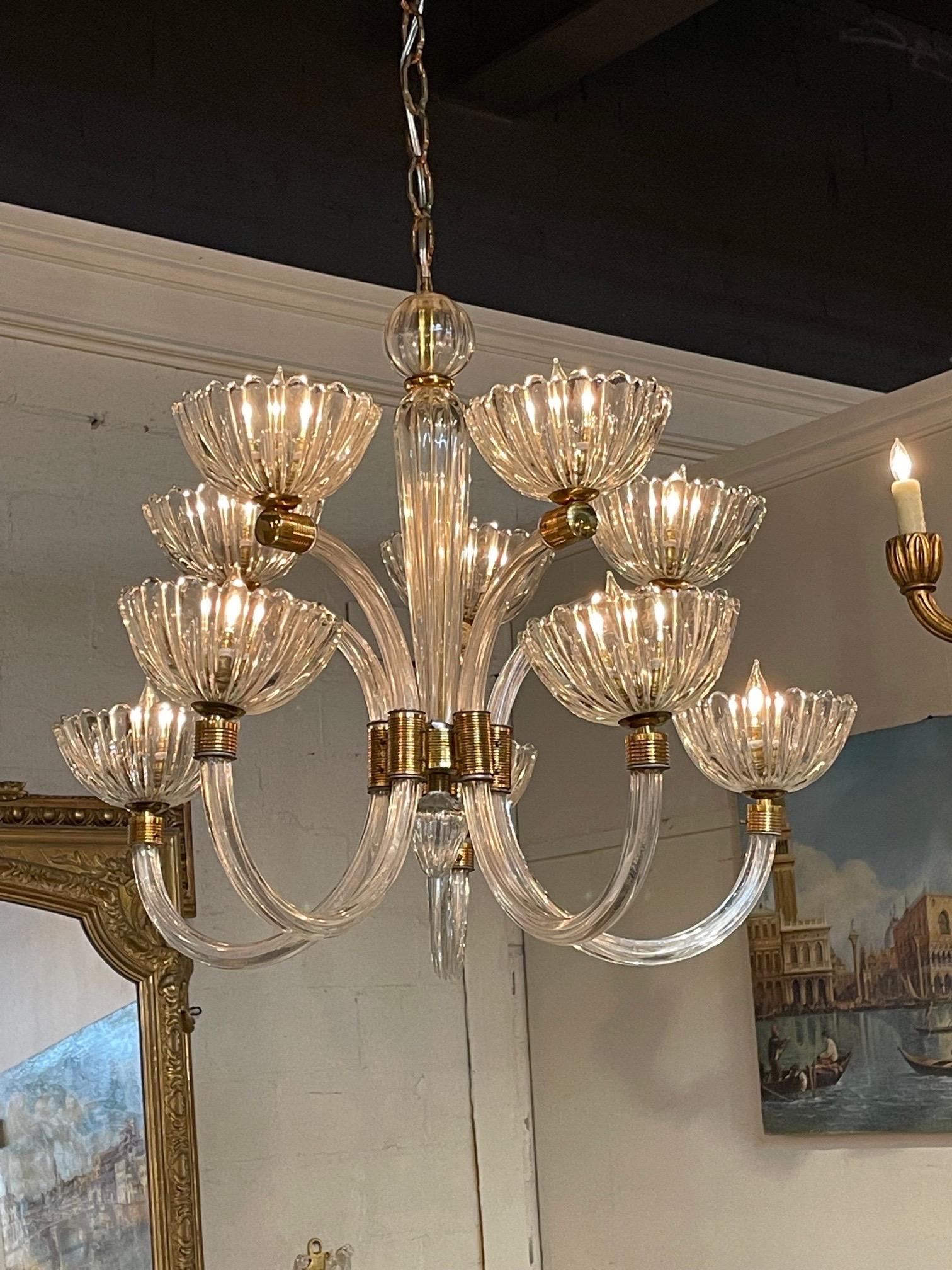 Lovely vintage Murano glass and brass 2 tier chandelier by Barovier. Beautiful scale and shape and the glass just glistens! So pretty! Note: There is a small crack on one of the cups. Not visible unless you search. Fixture is totally stable.