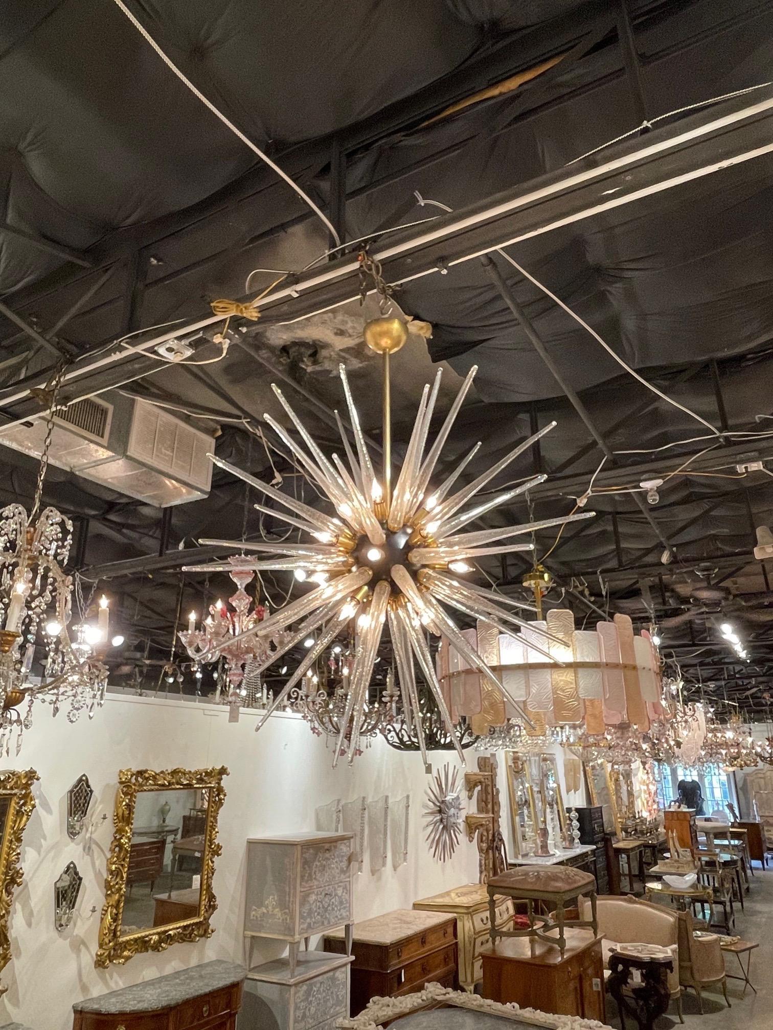 Stylish vintage Murano glass and brass sputnik chandelier. Great for modern decor and very unique! Makes a striking impact!