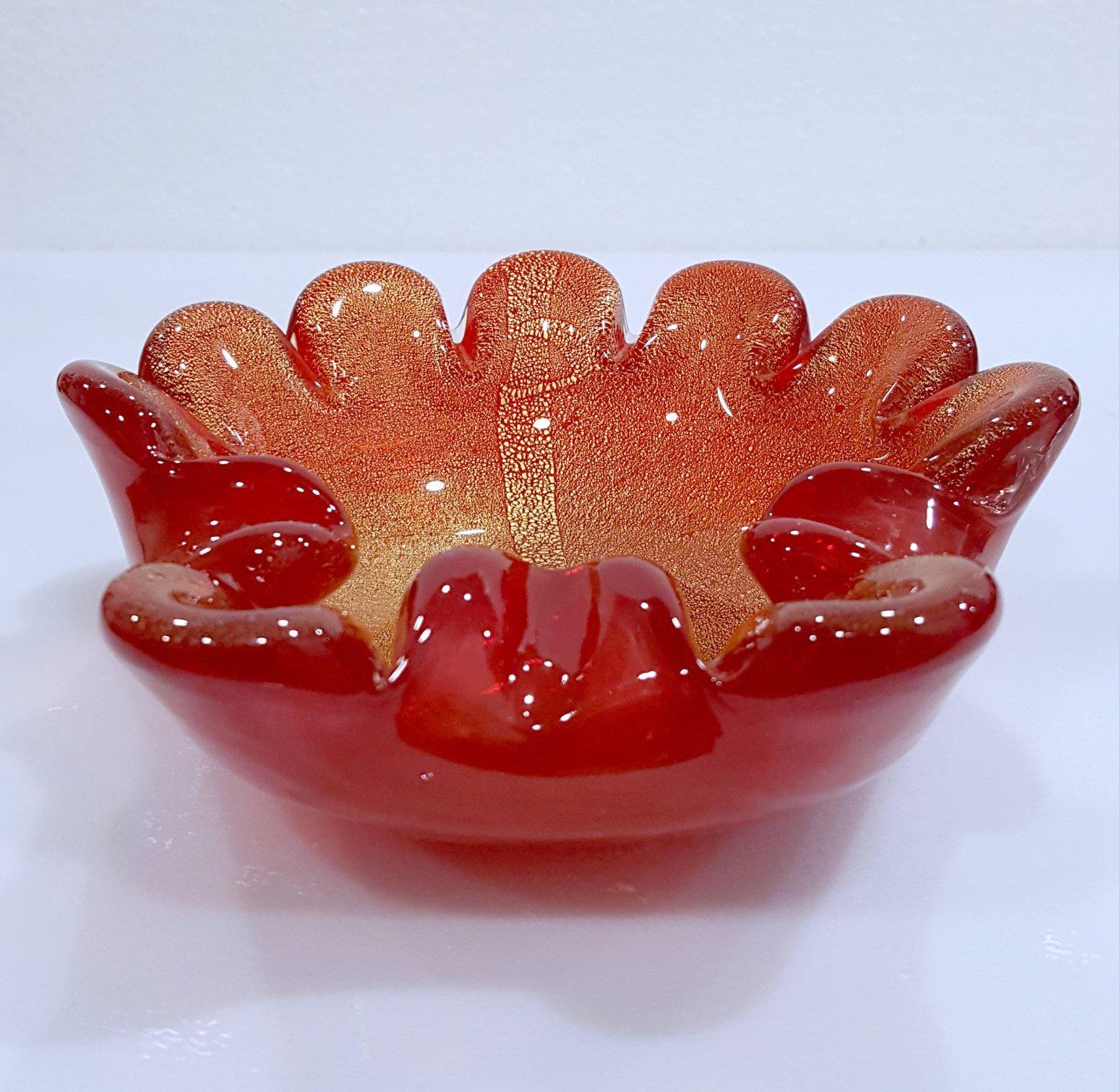Vintage Murano Glass Ashtray/Bowl with Gold Polveri (Barbini or Toso suspected) 
Good vintage condition. 
There are some scratches on the bottom, as is usual with vintage Murano glass.
Measurements are approximate. Please be aware that the color on