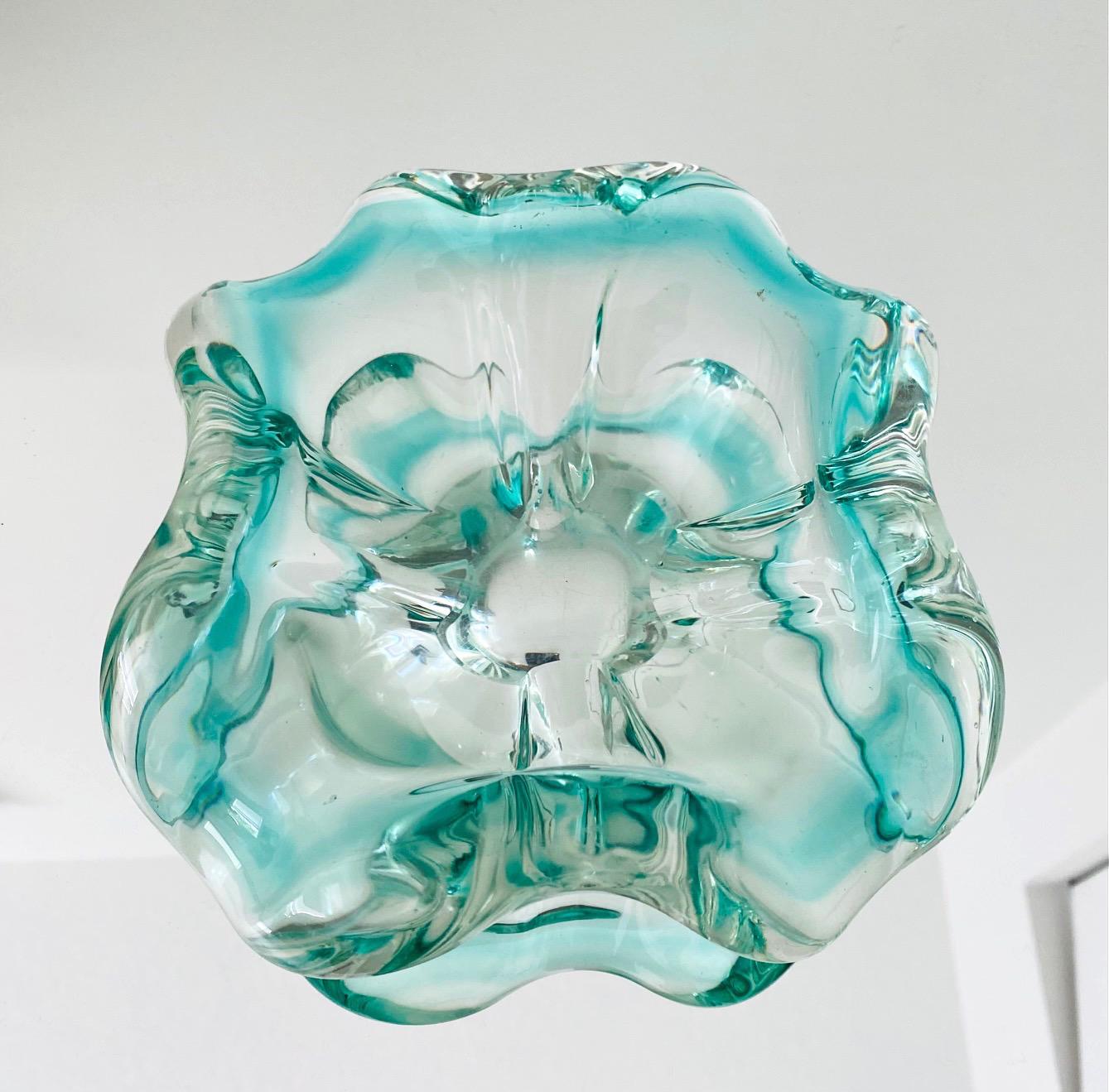 Mid-Century Modern Seguso bowl in handblown murano glass. Large heavy set glass features sommerso technique in aqua and clear glass. The bowl has thick curved rim design with polished edges. Gorgeous from any angle. Can be used as decorative bowl,