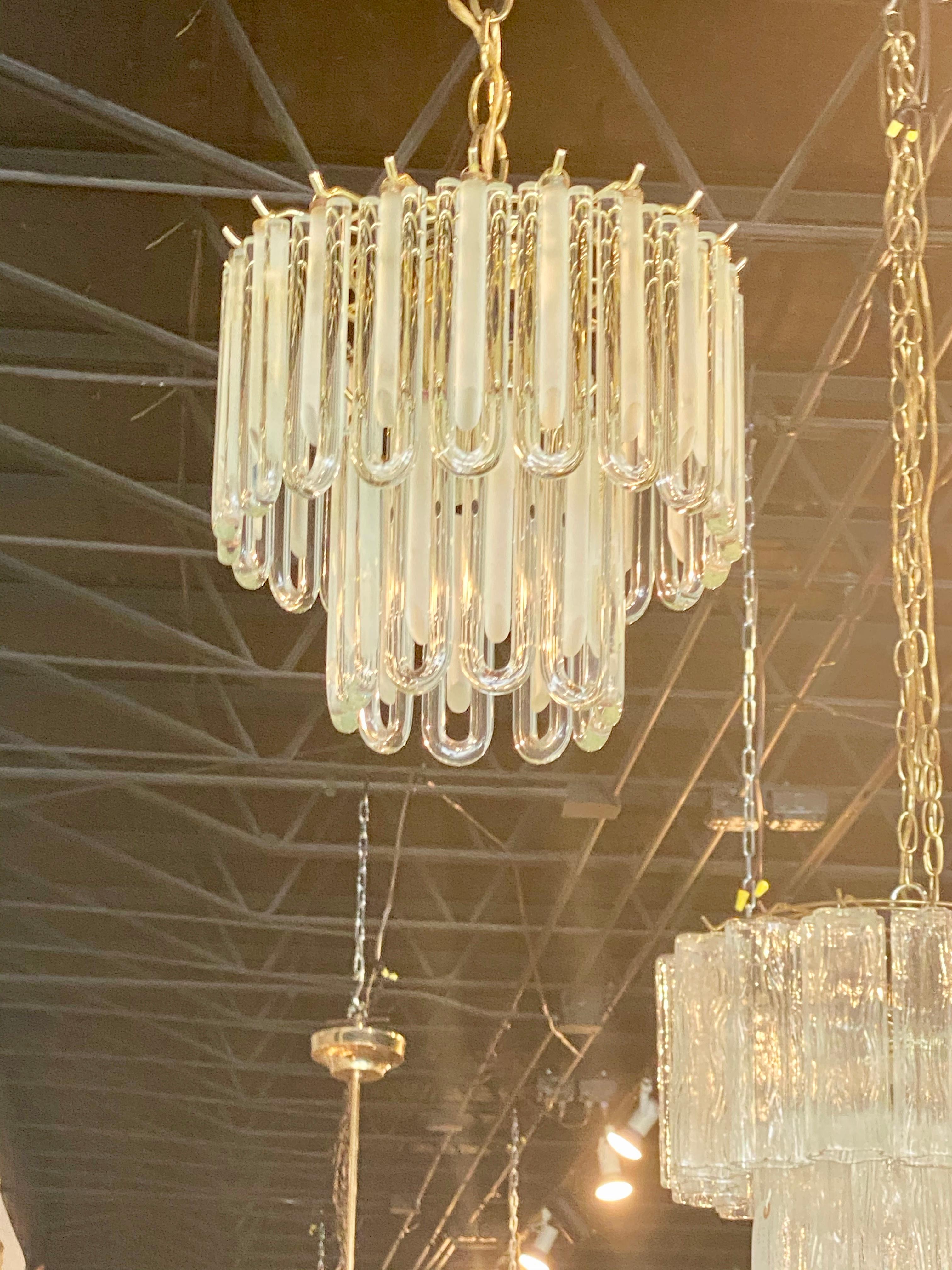 Lovely vintage Murano glass chandelier. Perfect size for a powder room, bathroom, closet, hall, etc. Brass cage. No broken pieces of glass. Comes with original ceiling canopy. Height below is for chandelier only, not chain.