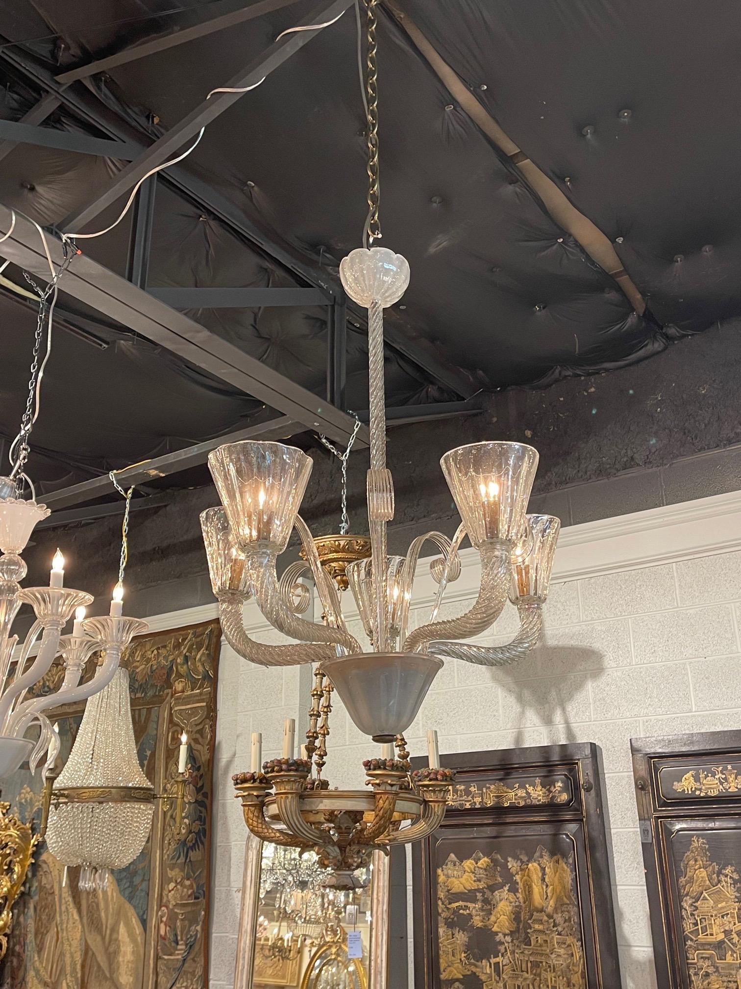 Beautiful vintage Murano glass chandelier with 5 lights. Pretty textured glass and nice scale and shape. Mixes with a variety of decors!