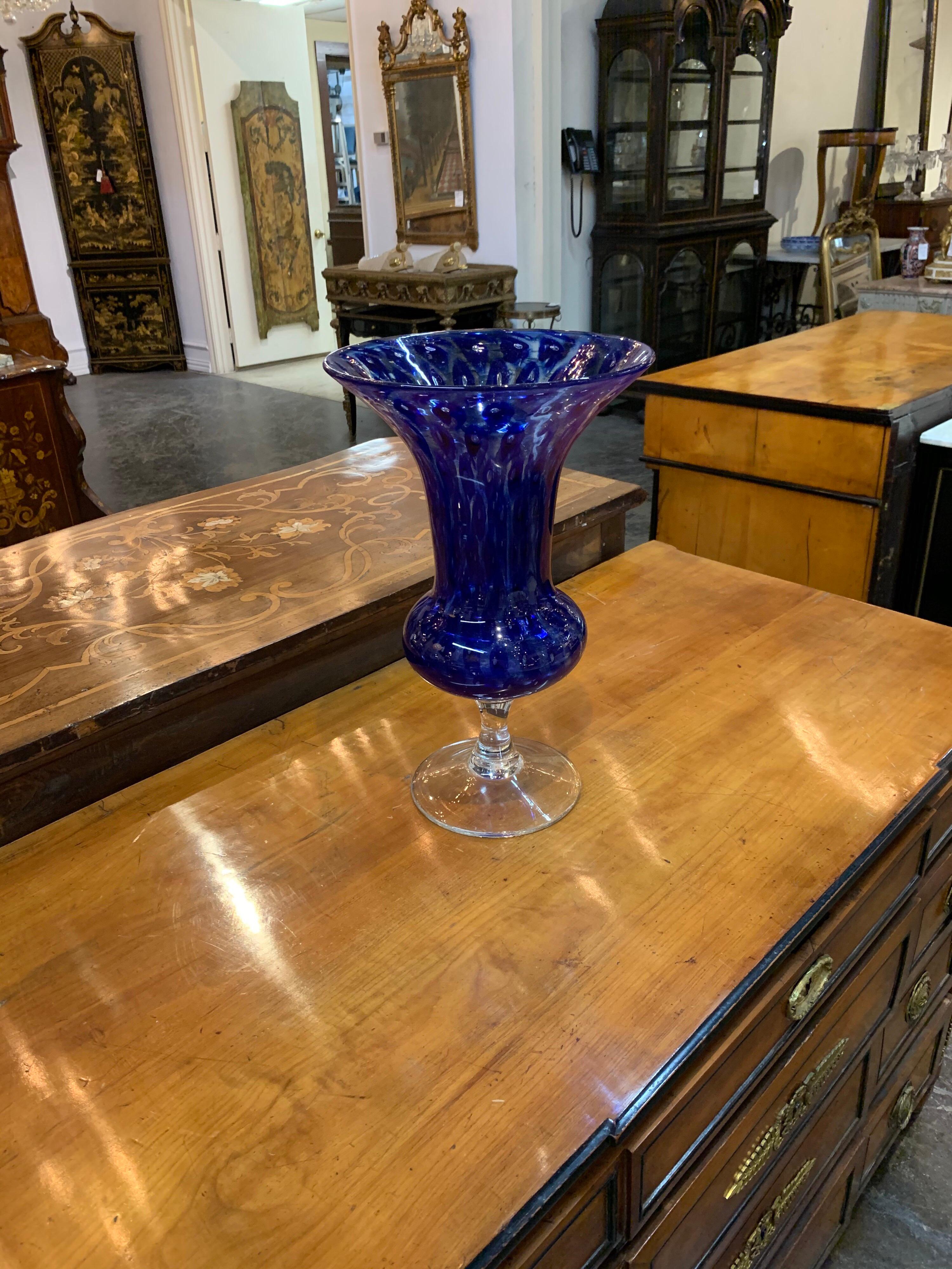 Gorgeous vintage Murano glass cobalt blue vase with a lovely swirling pattern. A beautiful accessory!