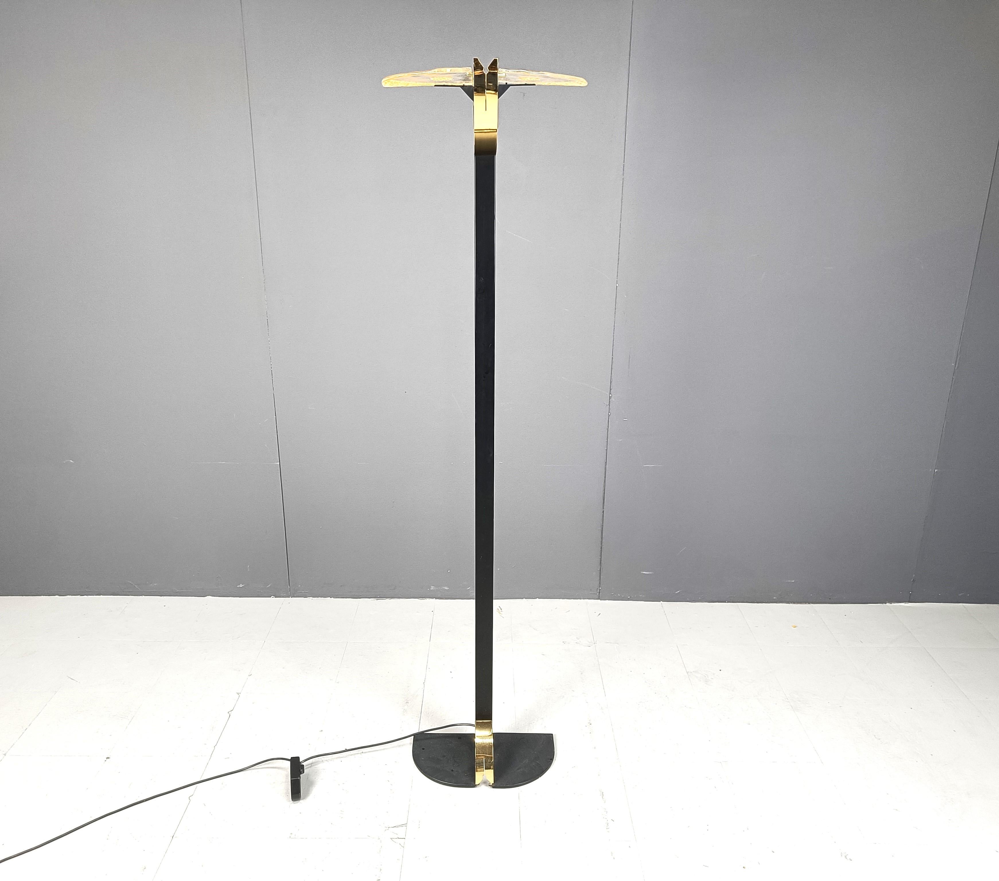 Fantastic modernist murano glass and black metal floor lamp.

The lamp's glass emits a fantastic diffuse light.

1980s-  Italy

Dimensions: 
Height: 190cm
Width: 46cm
Depth: 22cm

tested and ready to use.

Ref.: 525551

*Images are part of the