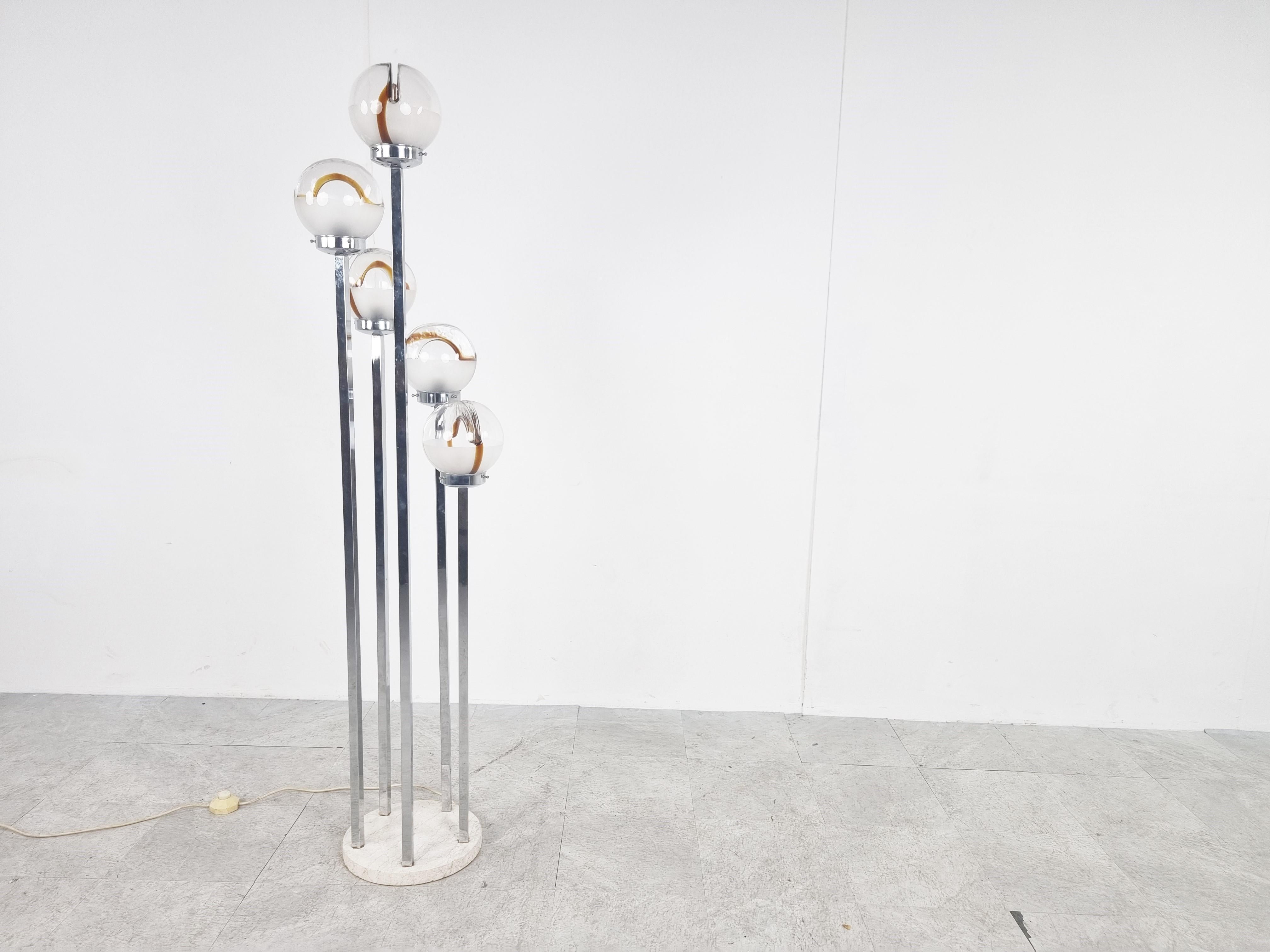 Rare mid-century floor lamp by AV Mazzega.

The lamp has a round white marble base and 5 chrome arms supporting 5 nicely shaped murano glass shades.

The lamp emits a beautiful light.

Good condition.

Tested and ready to use. 

1970s -