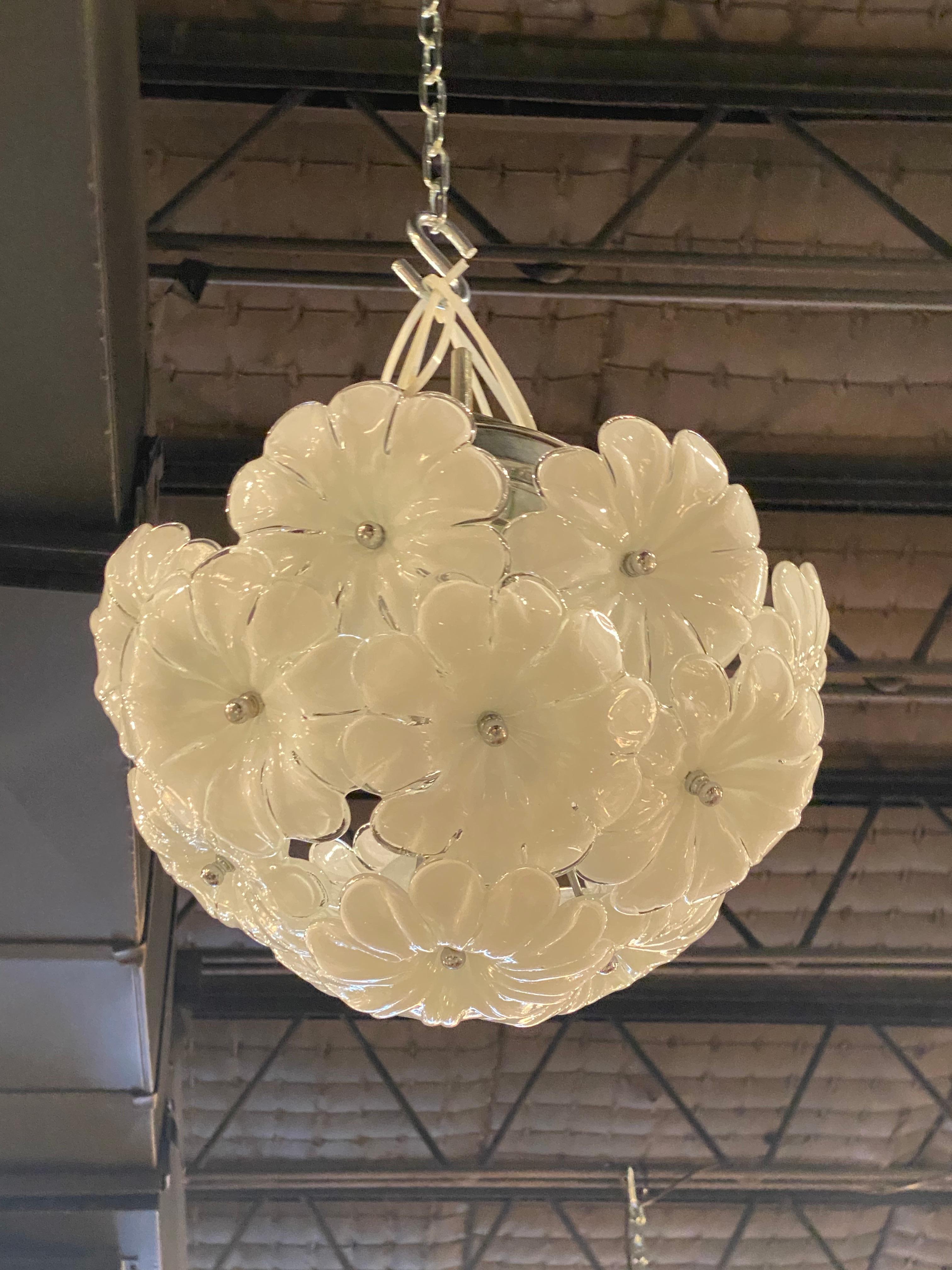 Beautiful vintage Murano glass chandelier. This is a ceiling flush mount with chrome cap to ceiling. No chipped or broken flowers. Takes 3 bulbs.