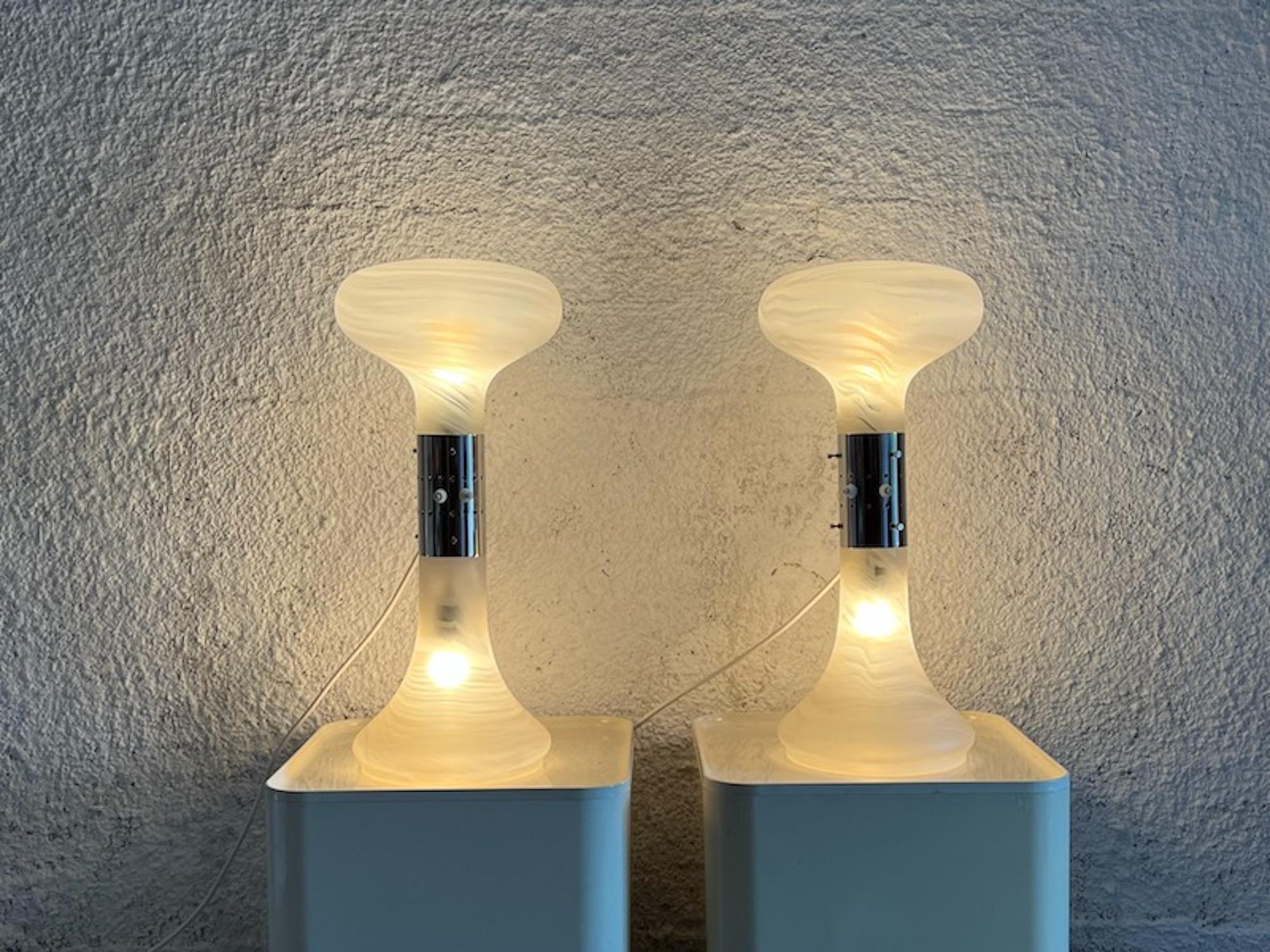 Amazing and rare 70s table lamps from the legendary series ‘Numerati’ by Carlo Nason for Mazzega, Italy.

This large lamps are made of the awesome mouth-blown translucent Murano glass. The white whirls add a touch of vintage sophistication.

In