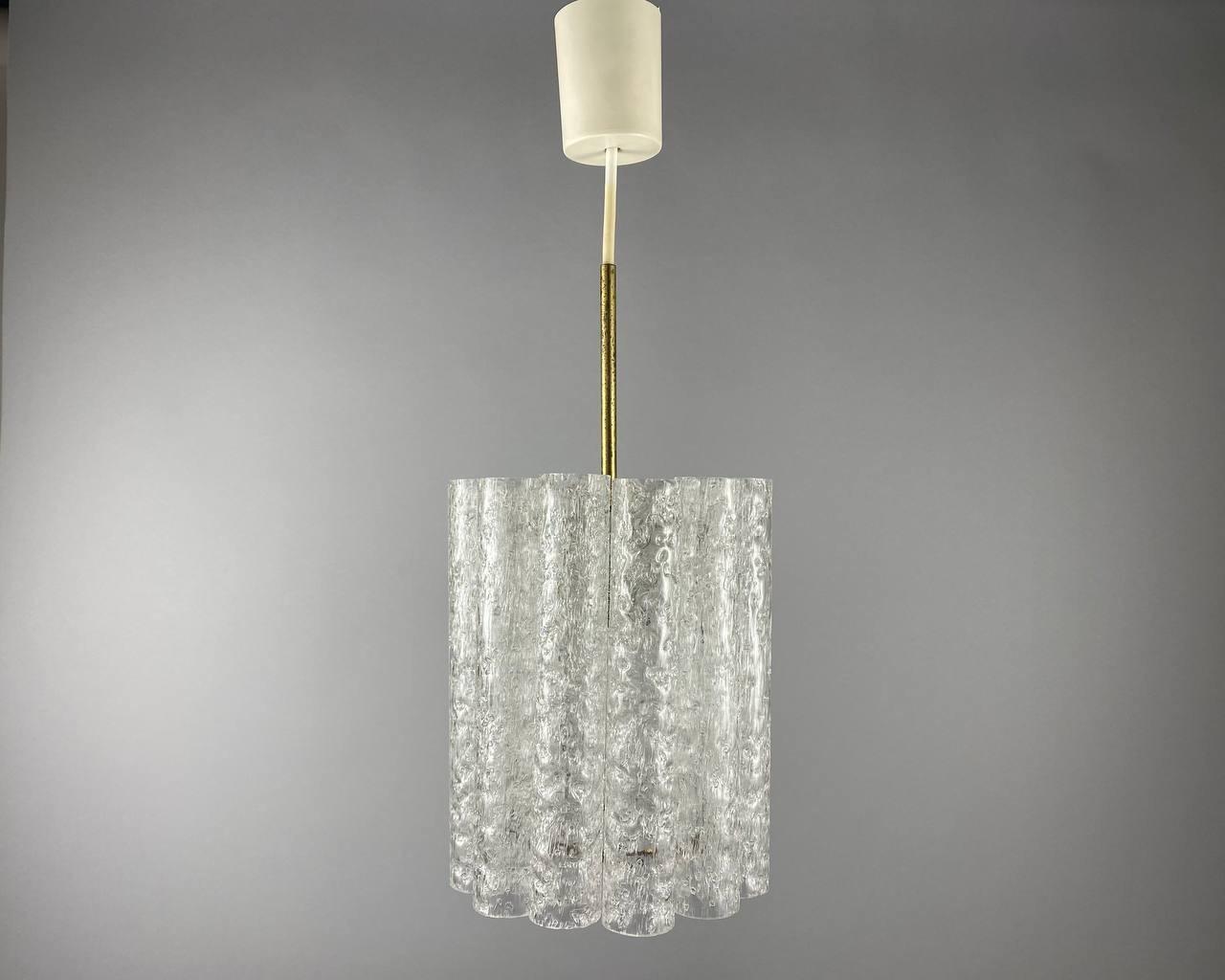 A wonderful Doria Leuchten ice glass chandelier from the 1960s, Germany. 

High-quality designer chandelier.

This Vintage Pendant Light made of Murano Glass. Original Tubes of Chandelier looks like Ice glass. The ring under and fitting are made