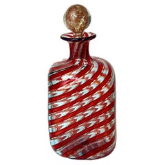 Vieux flacon de parfum en verre de Murano avec bouchon