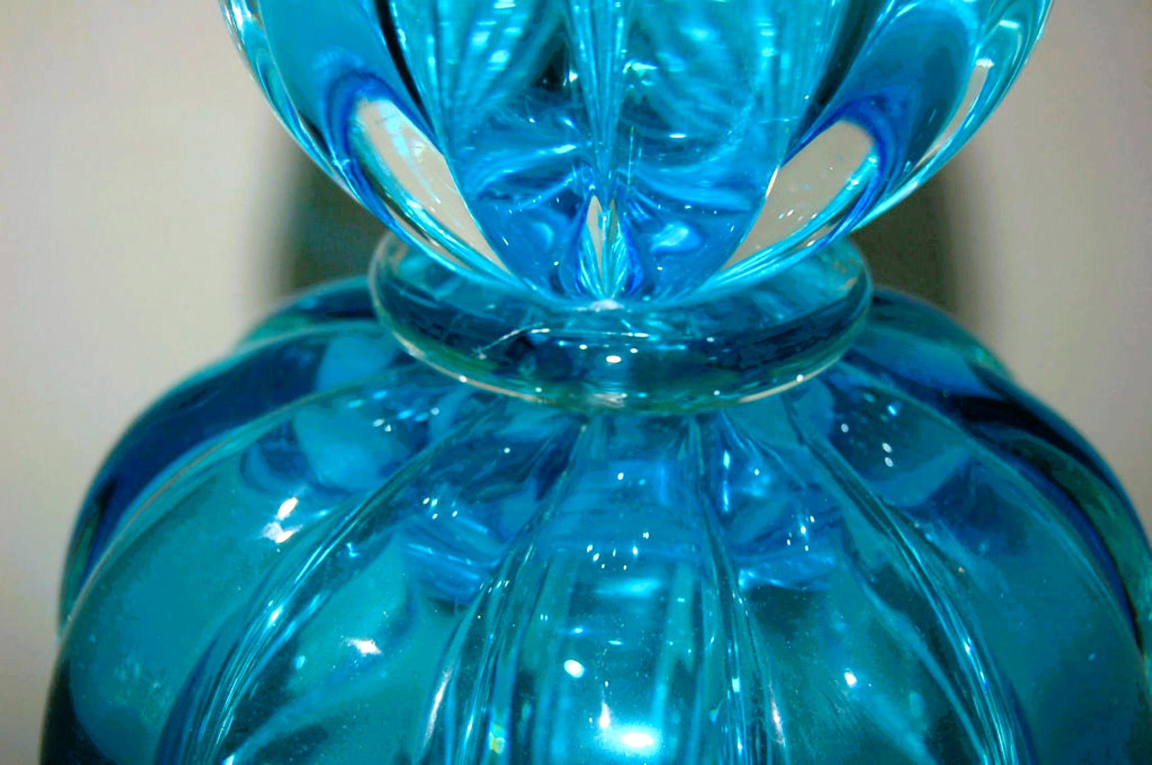 Classic 1940’s two-piece Murano glass lamps in MARINE BLUE on clear footed base. The way the glass goes from blue to clear is just magical! The lamps have been completely rebuilt using nickel plated solid brass hardware and UL listed