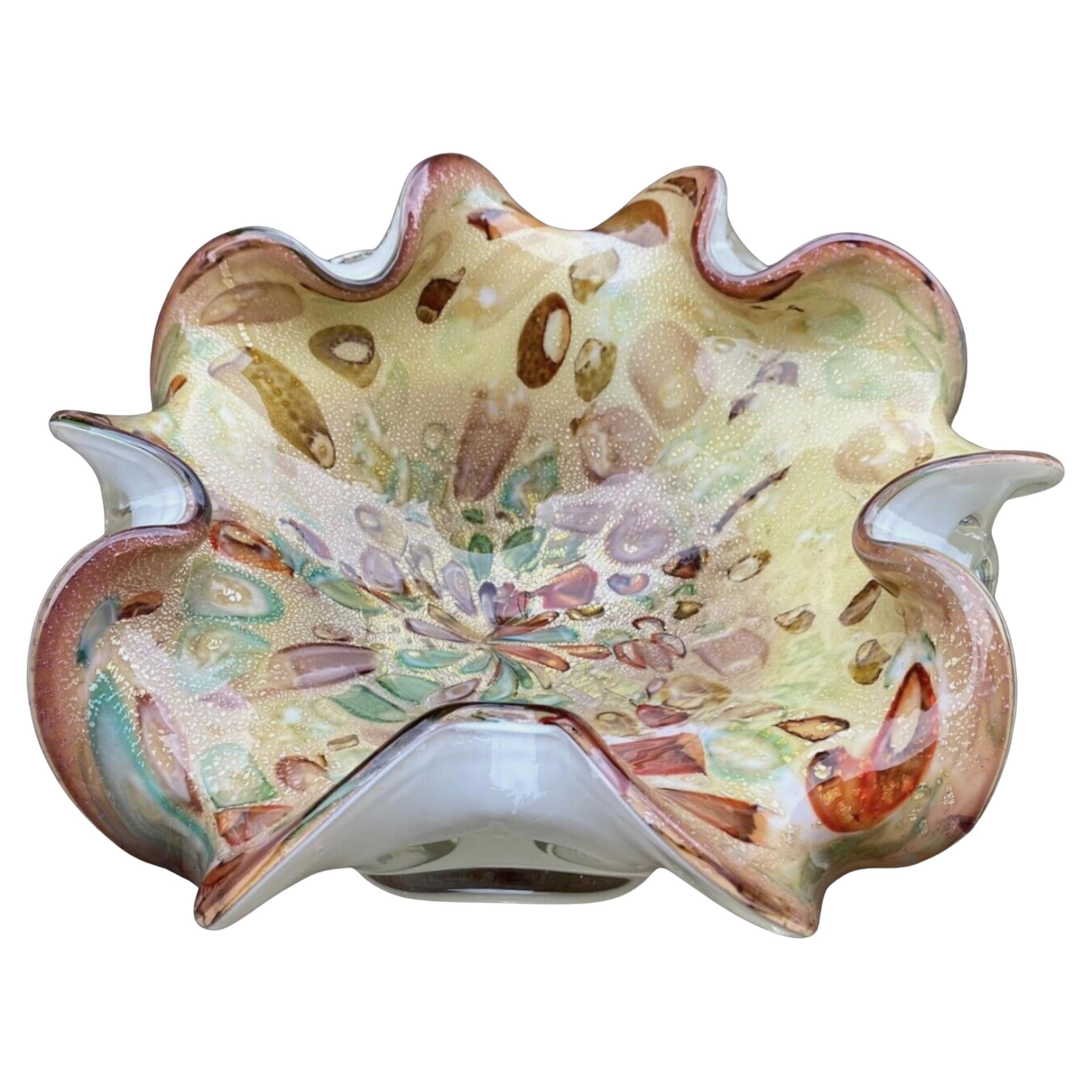 Vintage Murano Gold, Natural Aventurine Tutti Frutti Glass Dish Handkerchief Bowl Ashtray
“Circa 1950”
Made in Italy 
In fantastic condition 
Mid Century Modern 
Murano 

Striking mid-century Rare Tutti Frutti Murano glass bowl or ashtray with real