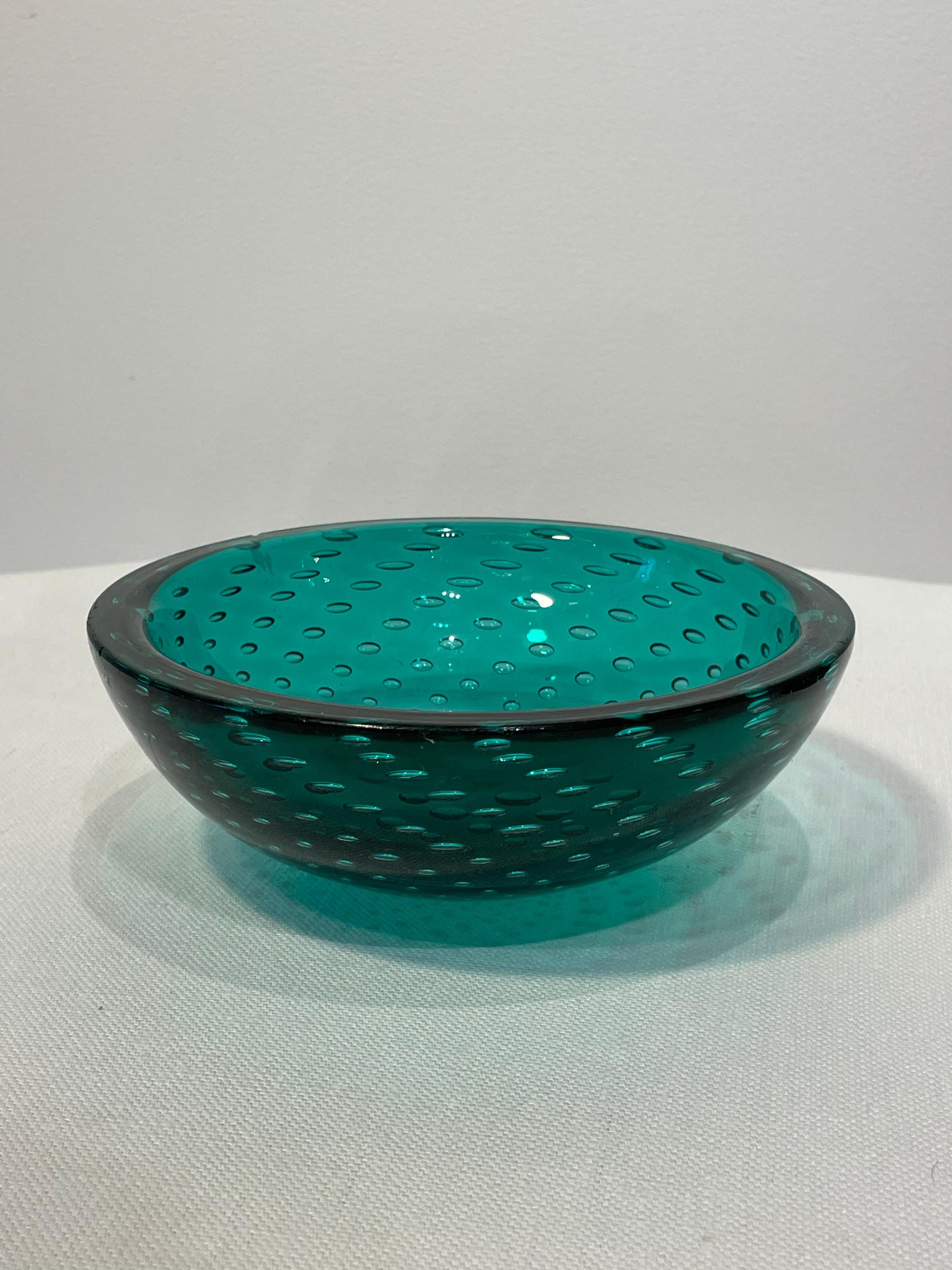 Green vintage murano dish.
Bubbled effect.

