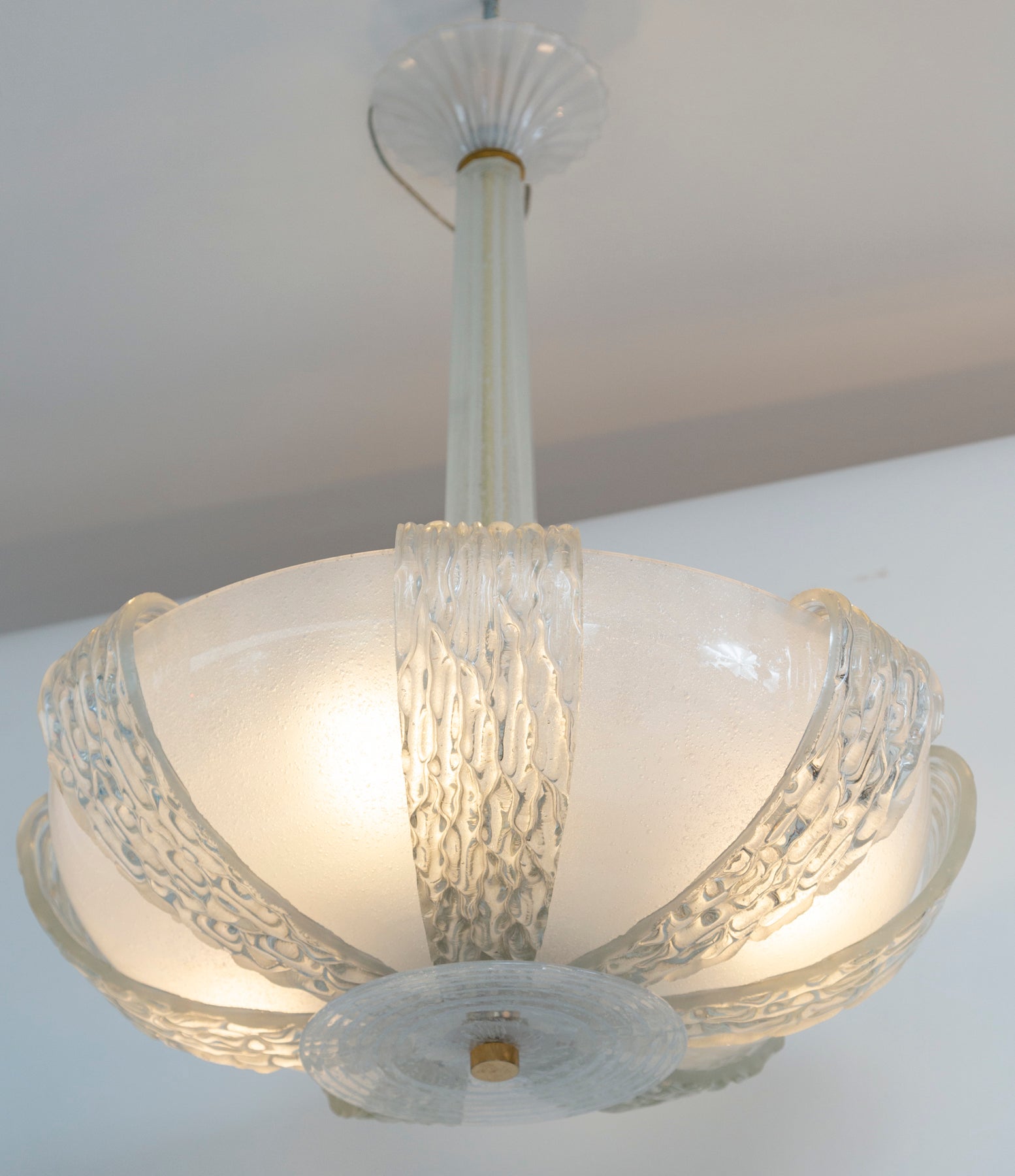 Vintage Venini  dome shaped ceiling fixture upheld by a lovely graduated center stem and canopy blown in the pulegoso technique (controlled bubbles that created a shimmery illumination)  and layered then layered with icy textured sleeves and thin