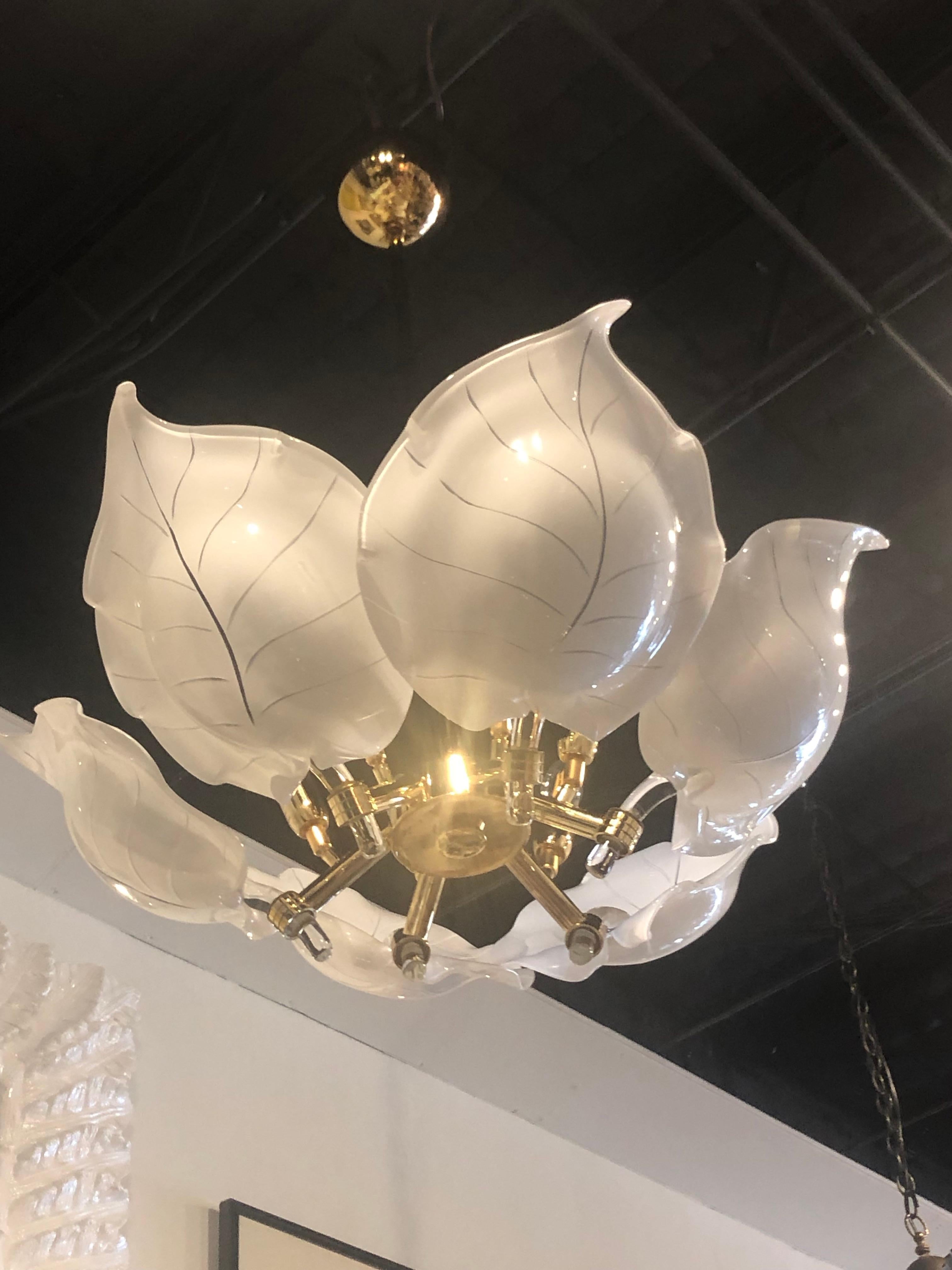 Lovely vintage Murano chandelier. Brass frame with original ceiling canopy and pole. No breaks or chips, very slight patina on frame. 6 lights. Measurement below is to top of brass pole.