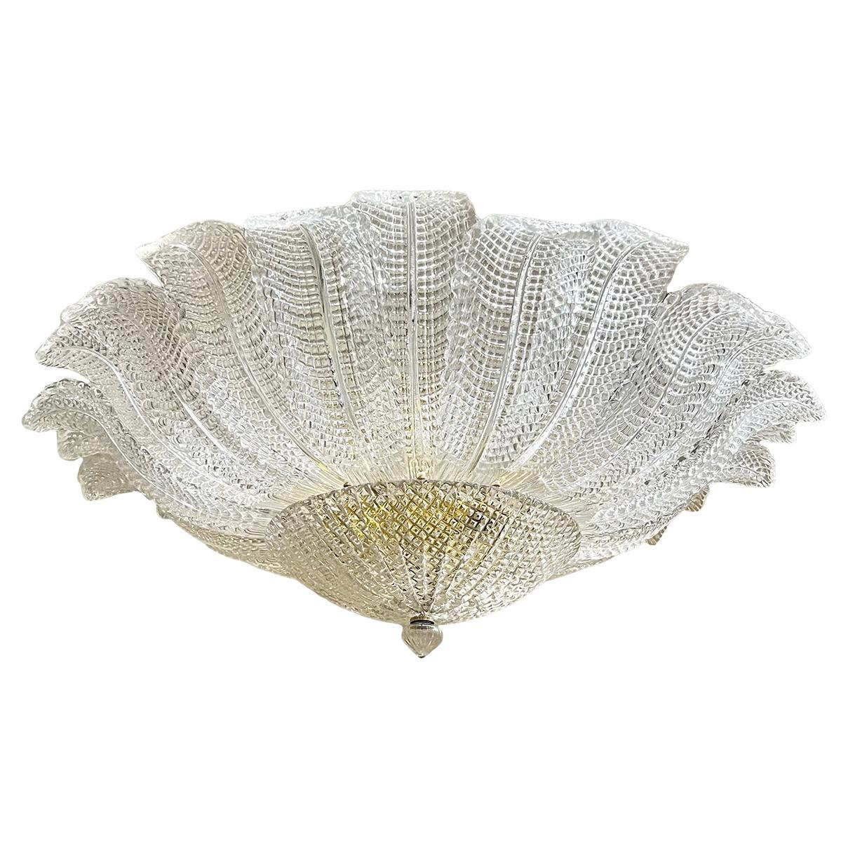 A circa 1960's Italian light fixture with molded glass leaves with 9 Edison lights.

Measurements:
Diameter: 43?
Drop: 15?.