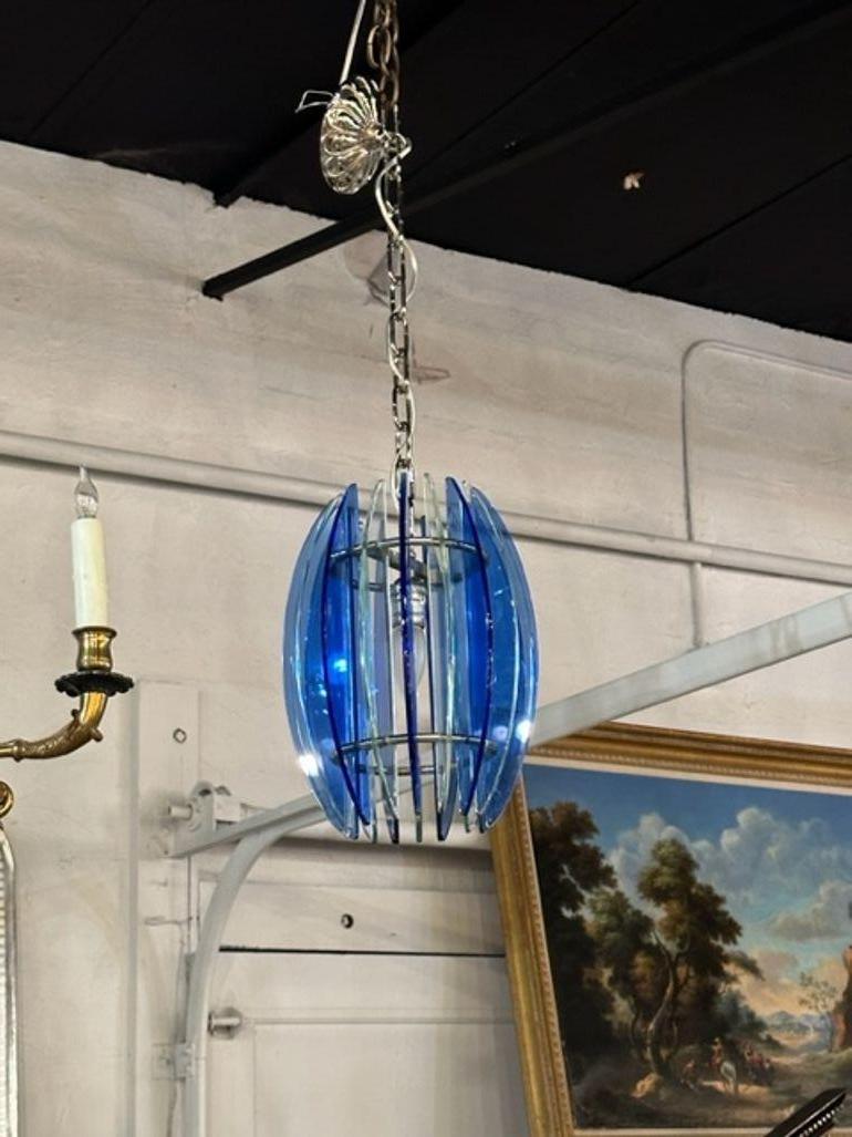Vintage Murano pendant light. circa 1970. The chandelier has been professionally rewired, comes with matching chain and canopy. It is ready to hang!