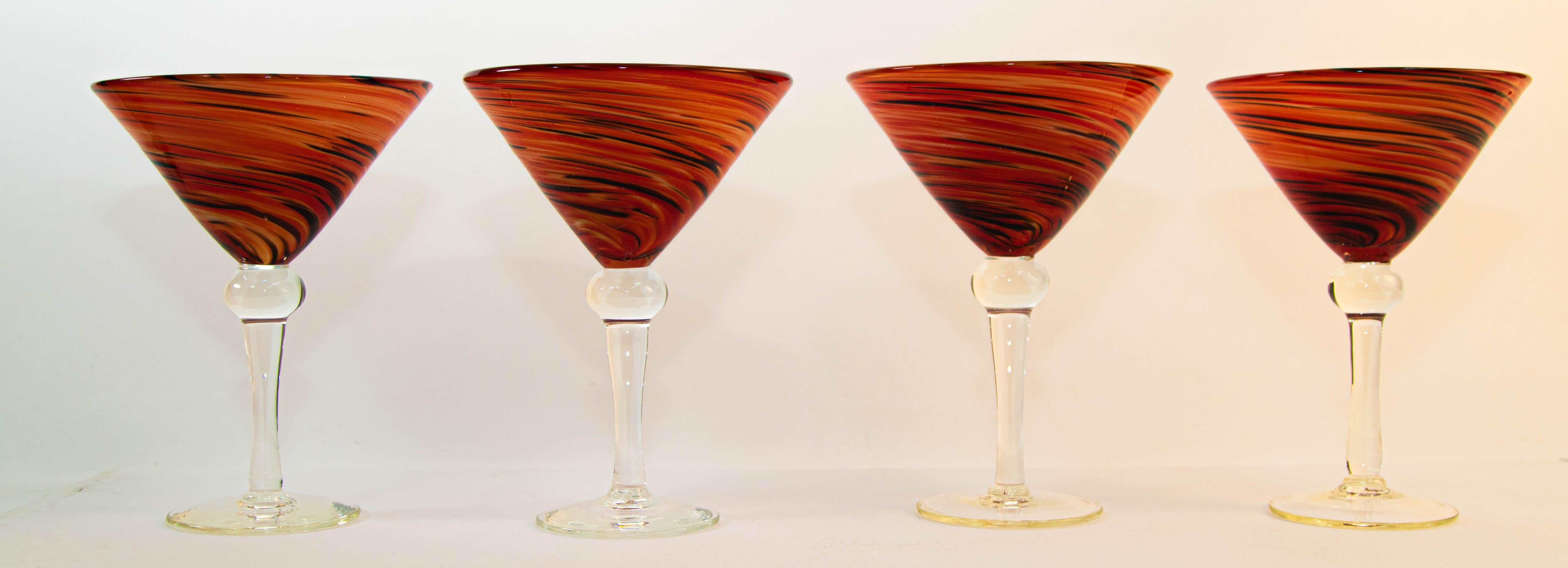 Vintage Post Modern Murano Red Swirl Martini glasses set of 4 colorful Barware.
The heavy large glasses are hand blown with deep red colorful abstract swirl design each glass in different design, each one is unique in design.
Vintage Post Modern
