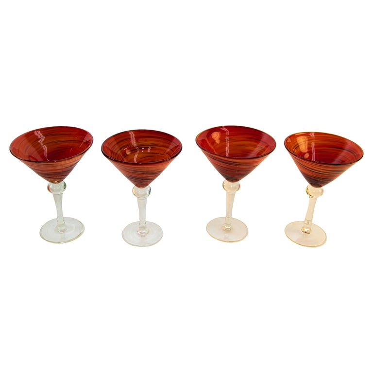 https://a.1stdibscdn.com/vintage-murano-red-swirl-martini-glasses-set-of-4-colorful-barware-for-sale/f_9068/f_332149521678380529315/f_33214952_1678380532353_bg_processed.jpg?width=768