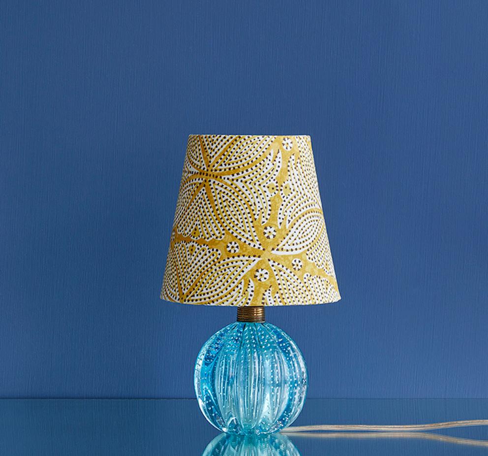 Italy, 1950's

Murano bullicante lamp in turquoise glass with customized shade.

Measures: H 30 x Ø 18 cm.