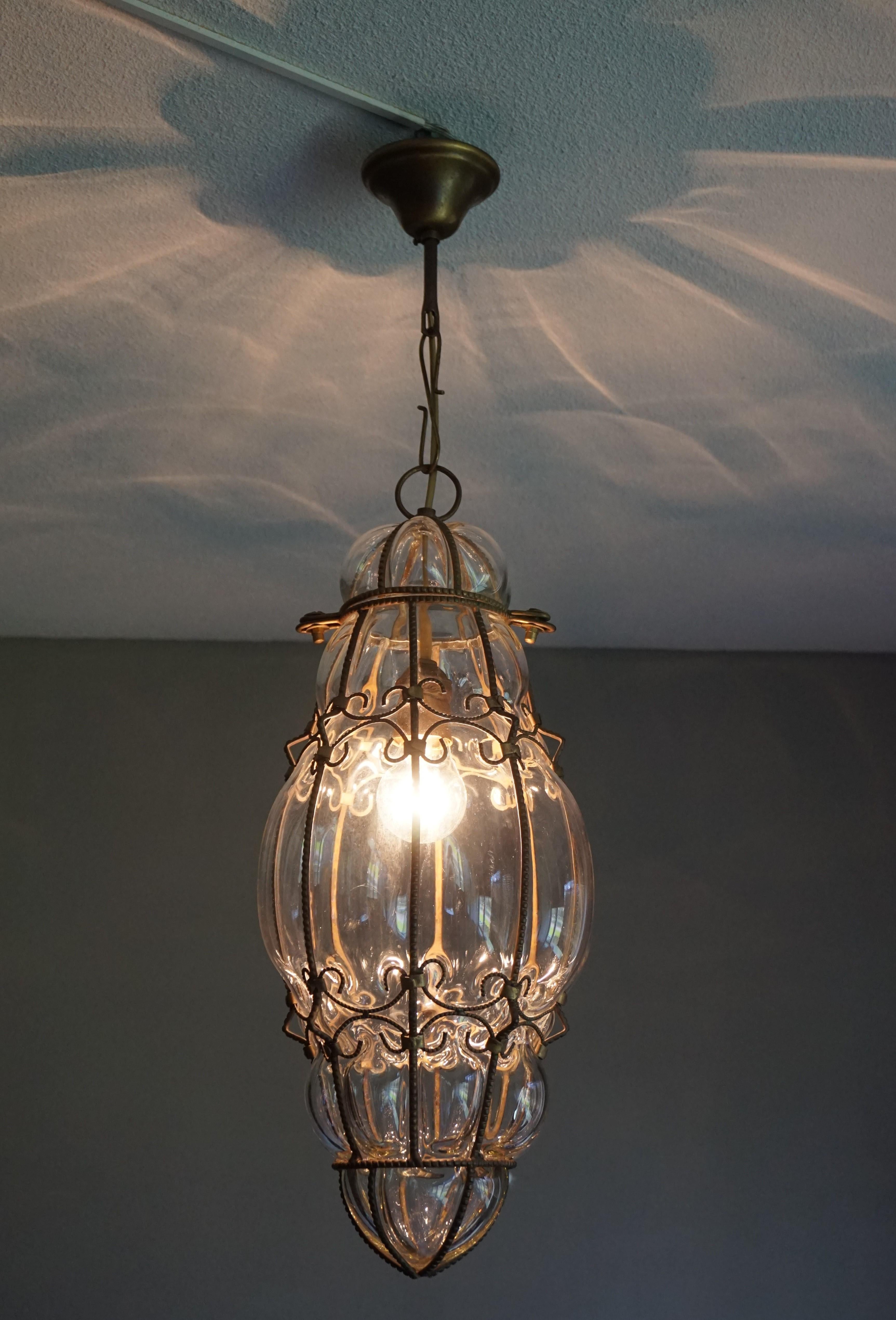 Rare, elongated design, midcentury made Italian pendant light.

There is nothing like a handcrafted, stylish and unique pendant to grace your entryhall with. This vintage Italian pendant simply is a beautiful work of lighting art to come home to.