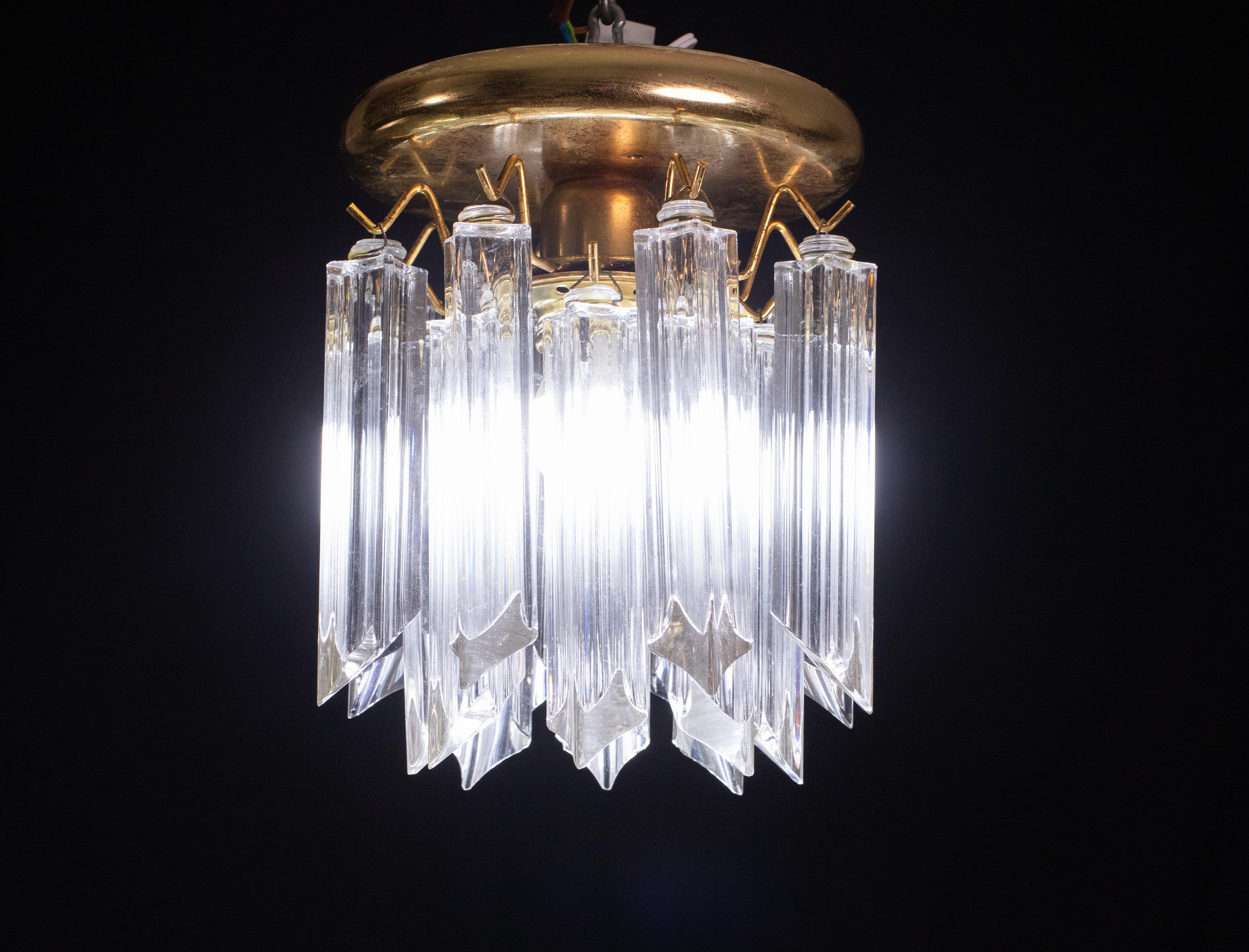 Stunning ceiling lamps attributed to Venini formed of prism-shaped glass.
Each pair mounts a light fitting.
Height 23 centimeters, diameter 20 centimeters.
Period: 1960
