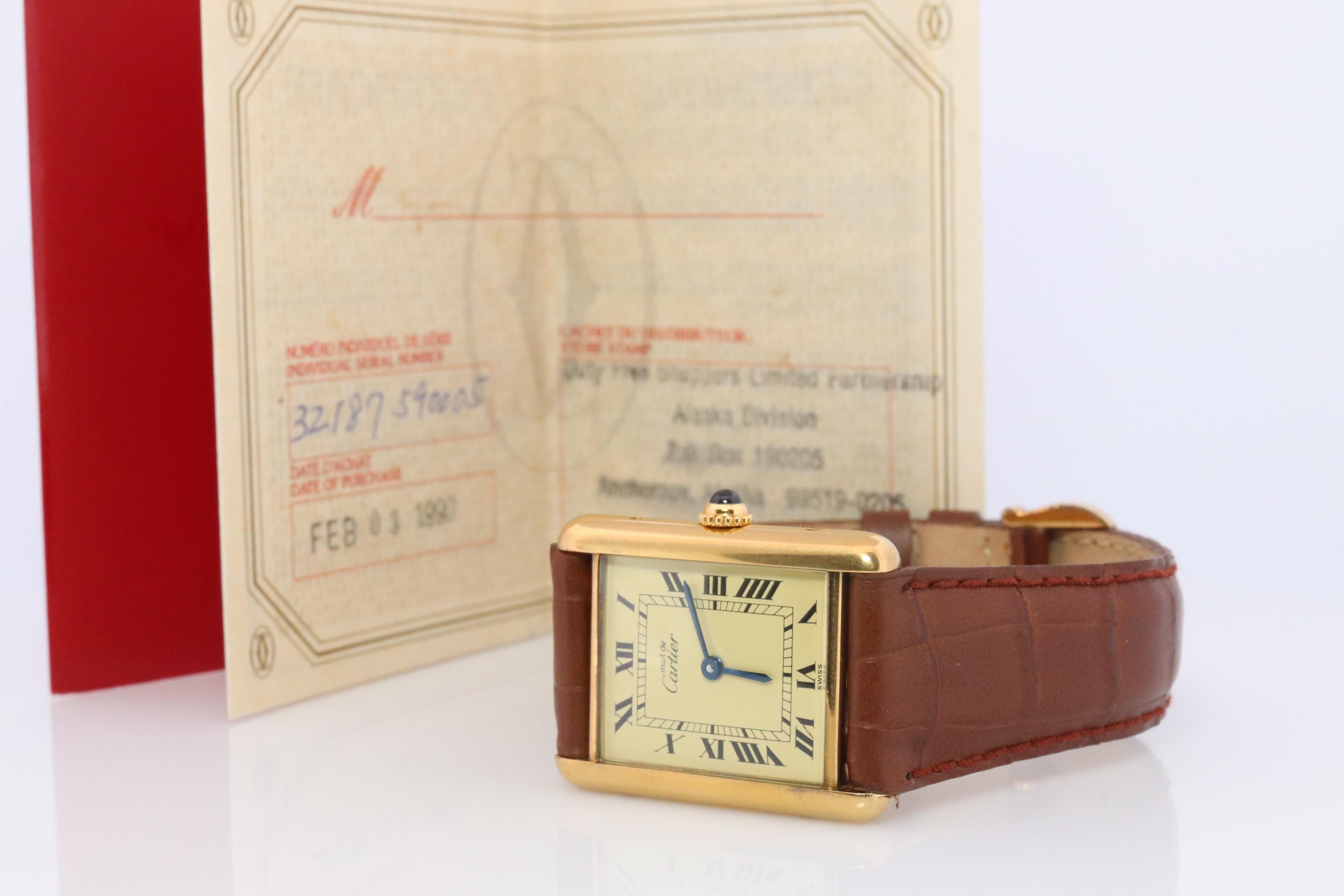 Genuine Cartier watch. Vintage Iconic Tank Argent. Sterling Silver and Gold plated (Vermeil).

Comes with a new GUCCI leather band

Champagne Dial with Quartz movement .
New battery replaced.

Original Cartier paperwork and Original Cartier