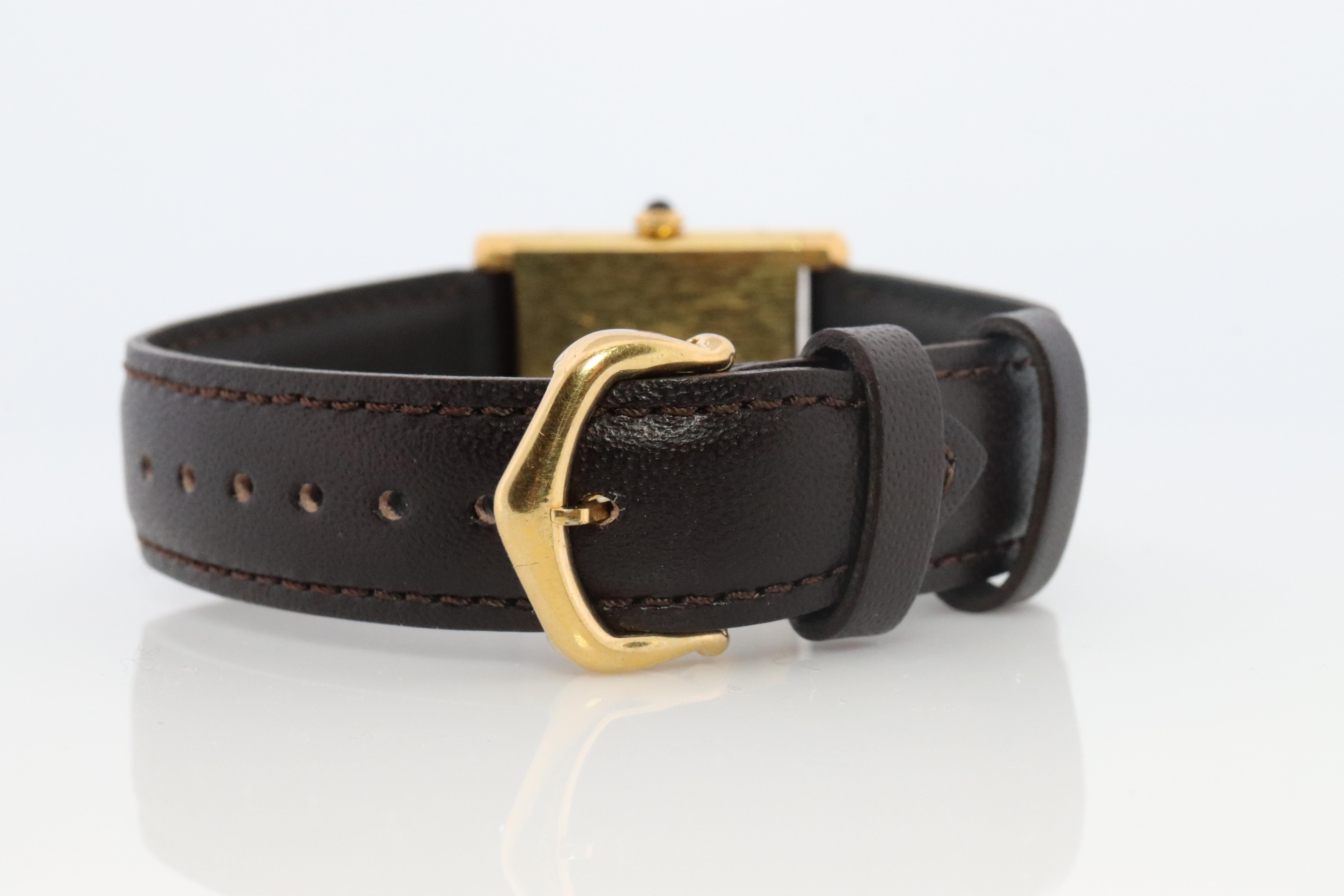Femenino o masculino Vintage Must de Cartier Mystery Tank Watch. ARGENT Manual Black Dial Tank. en venta