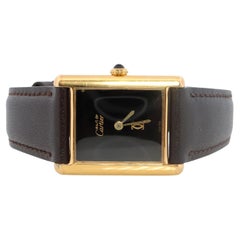 Vintage Must de Cartier Mystery Tank Watch. ARGENT Manual Black Dial Tank.