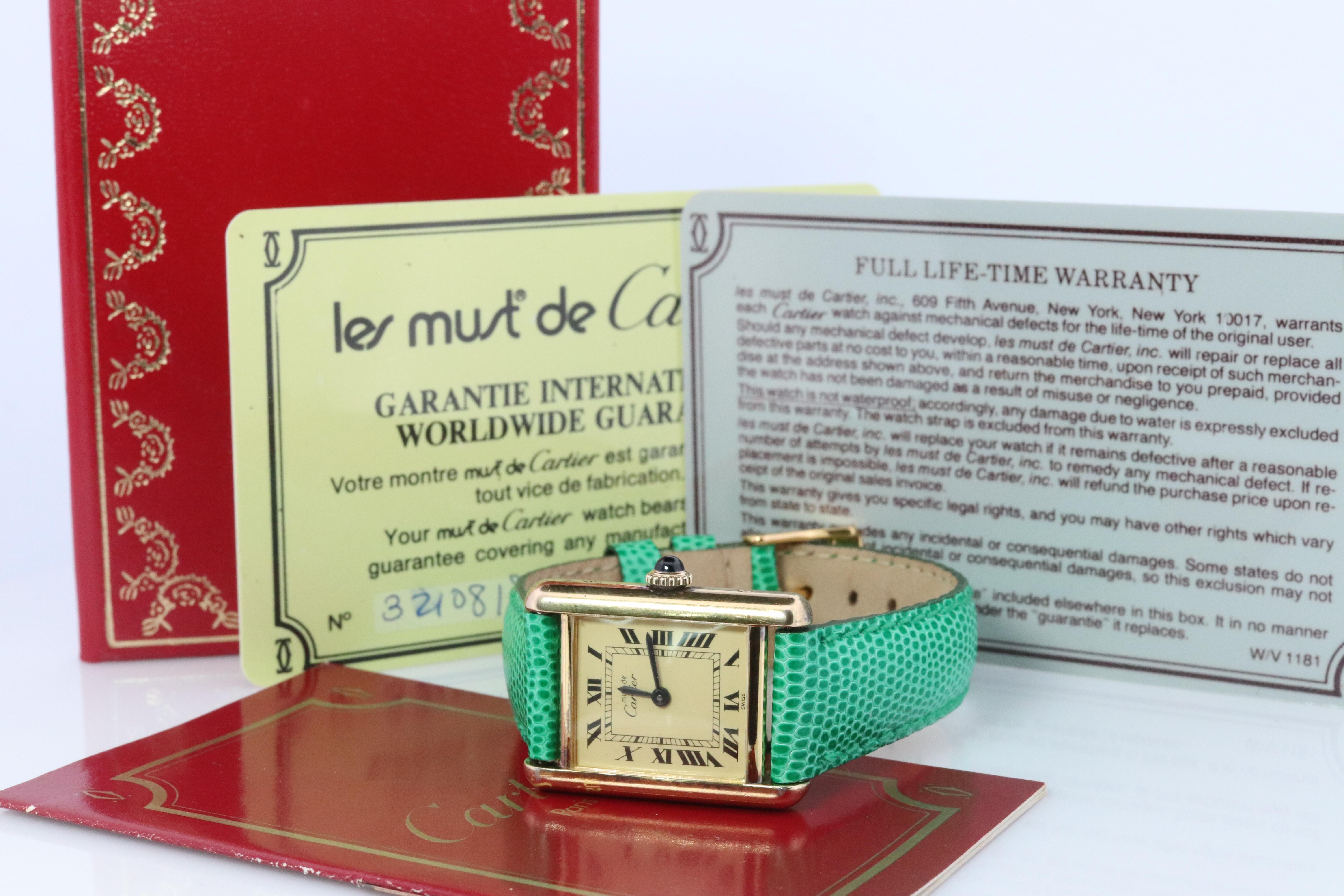 Genuine Cartier watch. Vintage Iconic Tank Argent. Sterling Silver and Gold plated (Vermeil).

Windup Manual Movement

RARE Roman Numbers Dial.

New Gucci Leather Band.

Condition: Original CARTIER Box. Original Paperwork

Details:
21mm by 28mm