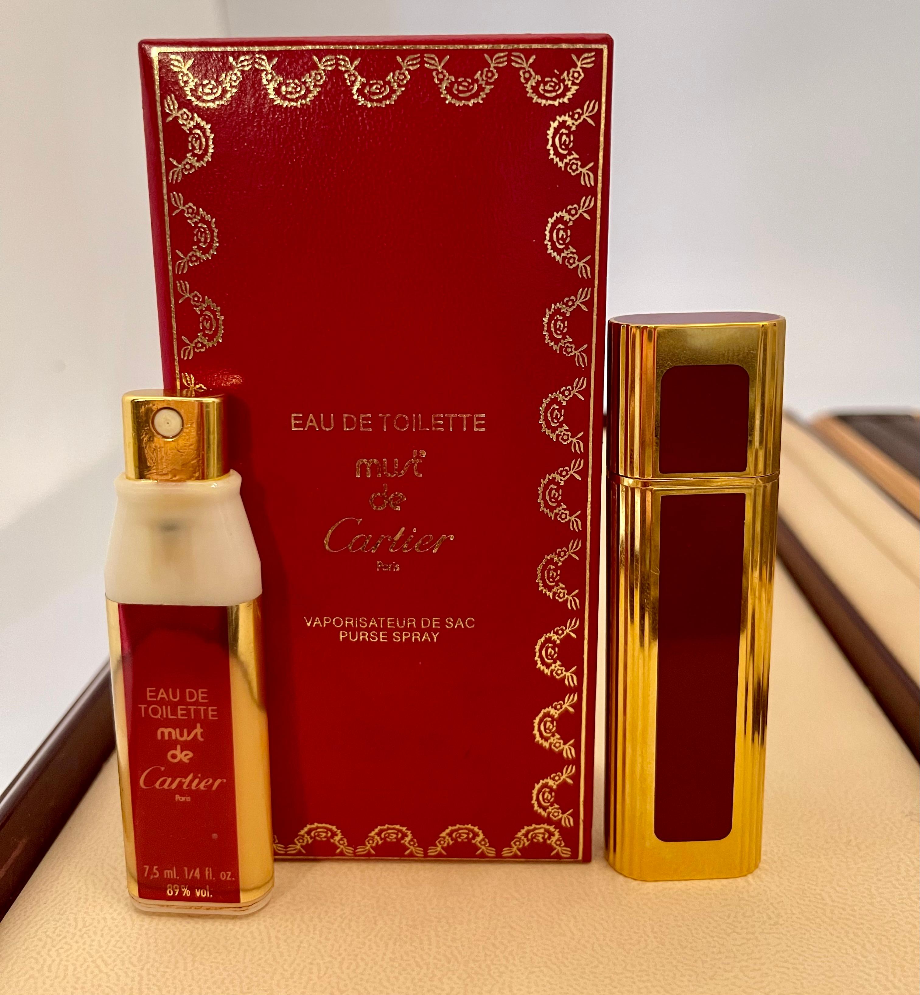 
Vintage Must De CARTIER* Vaporisateur Purse Spray 7.5 ML 1/4 FL OZ, Empty , RARECartier Made in France
Stamped  : Parfumes Cartier Paris
Perume bottle refill is empty. But you can replace with a new refill.


It's an Estate piece so all
