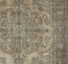 Tappeto Tabriz persiano vintage con grande medaglione floreale nei toni della terra