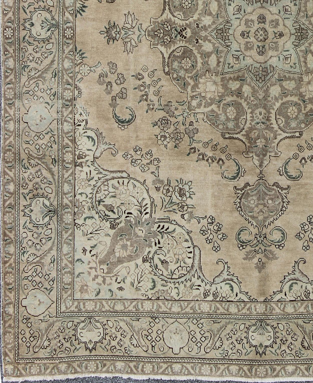 Hand-Knotted Vintage Muted Persian Tabriz Rug With Large Floral Medallion in Earthy Tones For Sale