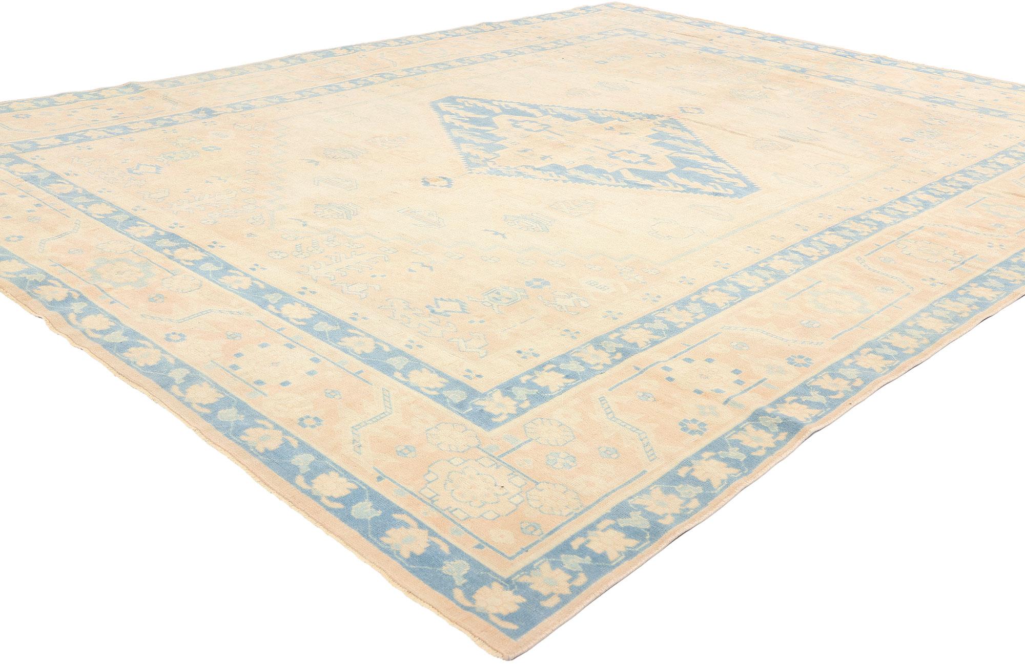 53709 Vintage Peach Turkish Oushak Rug, 07'01 x 09'03. Antique-washed Turkish Oushak rugs undergo a rigorous washing process designed to maintain their texture and pile integrity. This delicate treatment softens the colors and reveals subtle