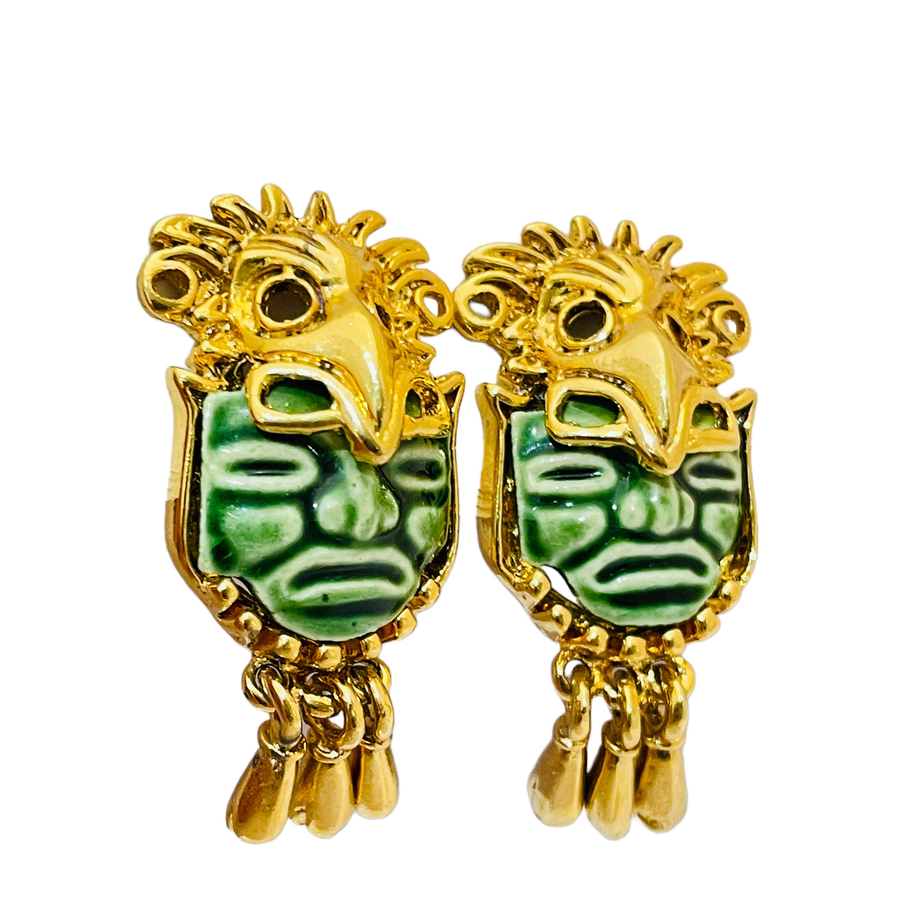 DETAILS

• signed MEXICO (designer name)

• gold tone with ceramic stone

• vintage designer clip on earrings

MEASUREMENTS

• 1.5