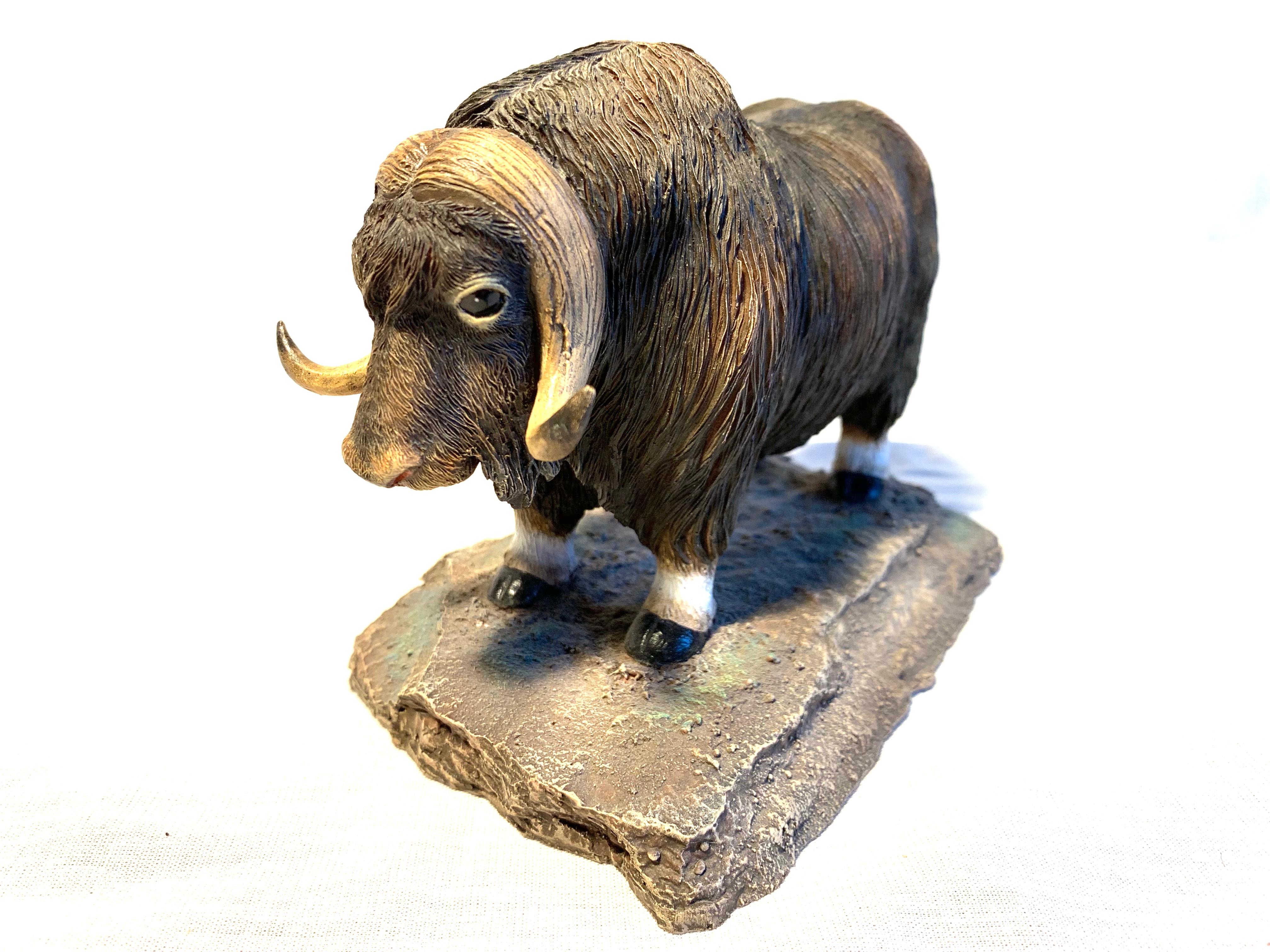 This is a rare handcrafted and hand painted Royal Scandinavian musk ox sculpture.