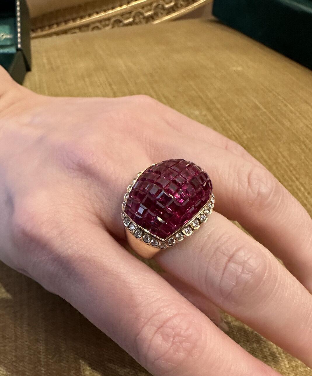 Wide Ruby and Diamond Bombe Ring in 18k Yellow Gold

Mystery Set Ruby & Diamond Bombe Dome Ring features Calibrated Rubies Mystery set in Dome style bordered by Round Brilliant Diamonds with Scalloped edge set in 18k Yellow Gold.

Total ruby weight
