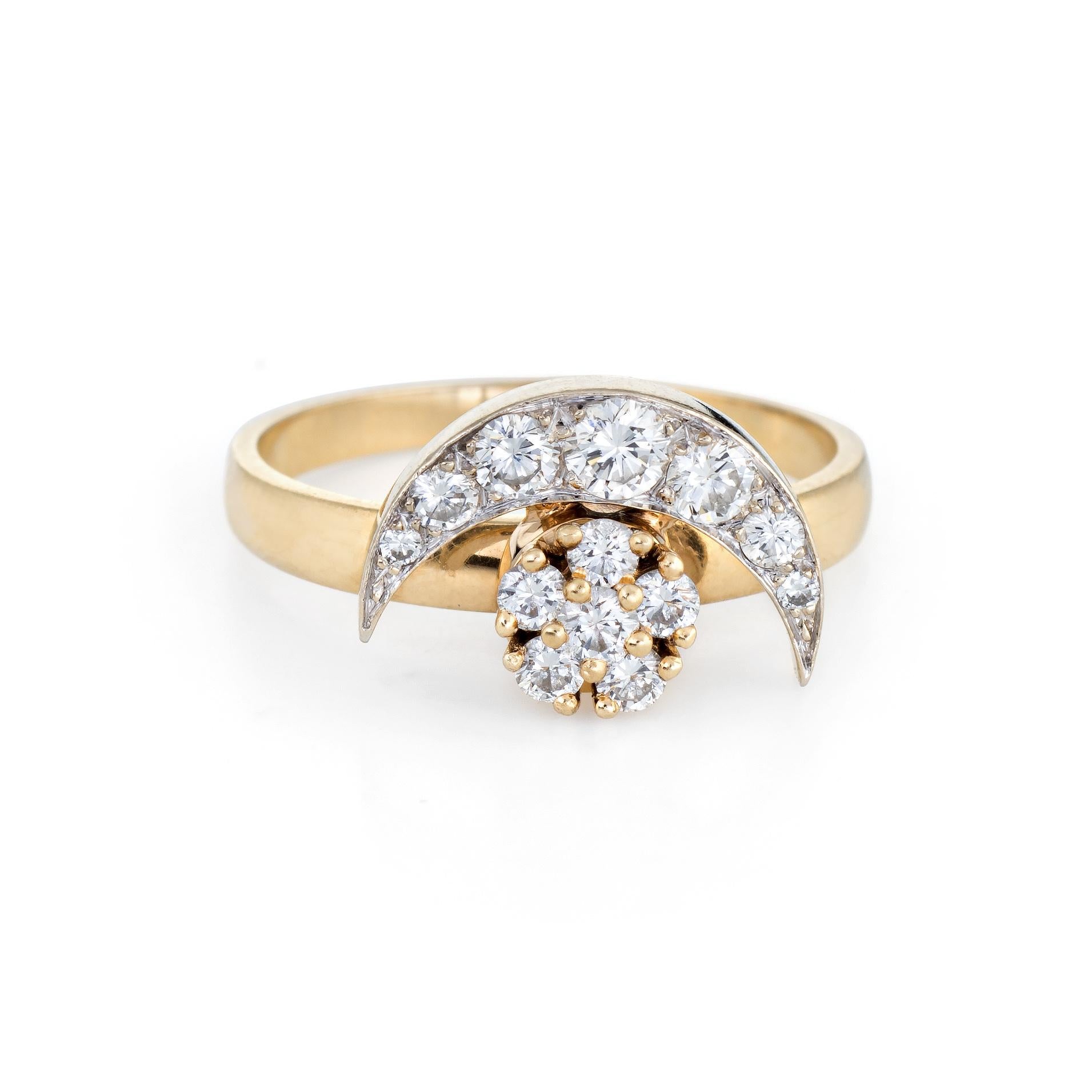 Finely detailed vintage spinning ring (circa 1980), crafted in 14 karat yellow gold. 

Round brilliant cut diamonds graduate in size from 0.01 to 0.07 carats. The total diamond weight is estimated at 0.50 carats (estimated at H-I color and VS2-SI1