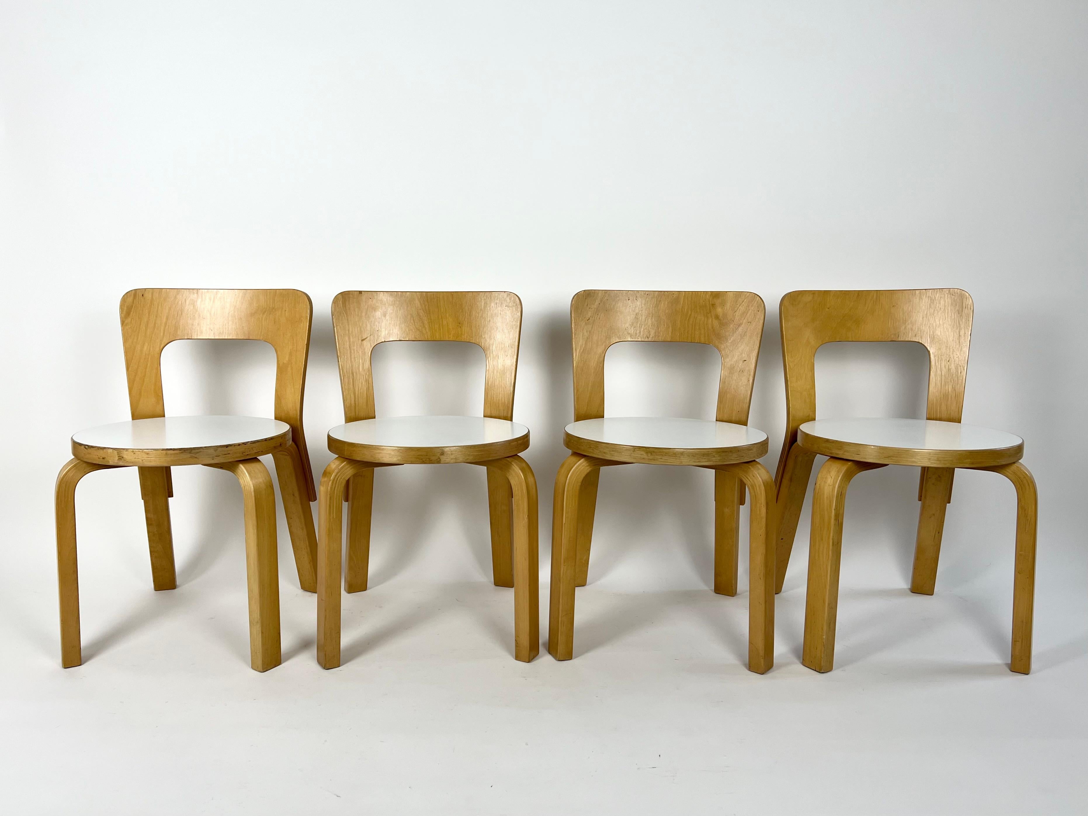 Kid's chairs by Alvar Aalto, model N65 for Artek, Finland.

This set of children's chairs date from the 1960s - 70s, retailed in the USA by ICF New York. Labels are present to the underside of all 4 chairs.

Birch bentwood with white laminate seat.