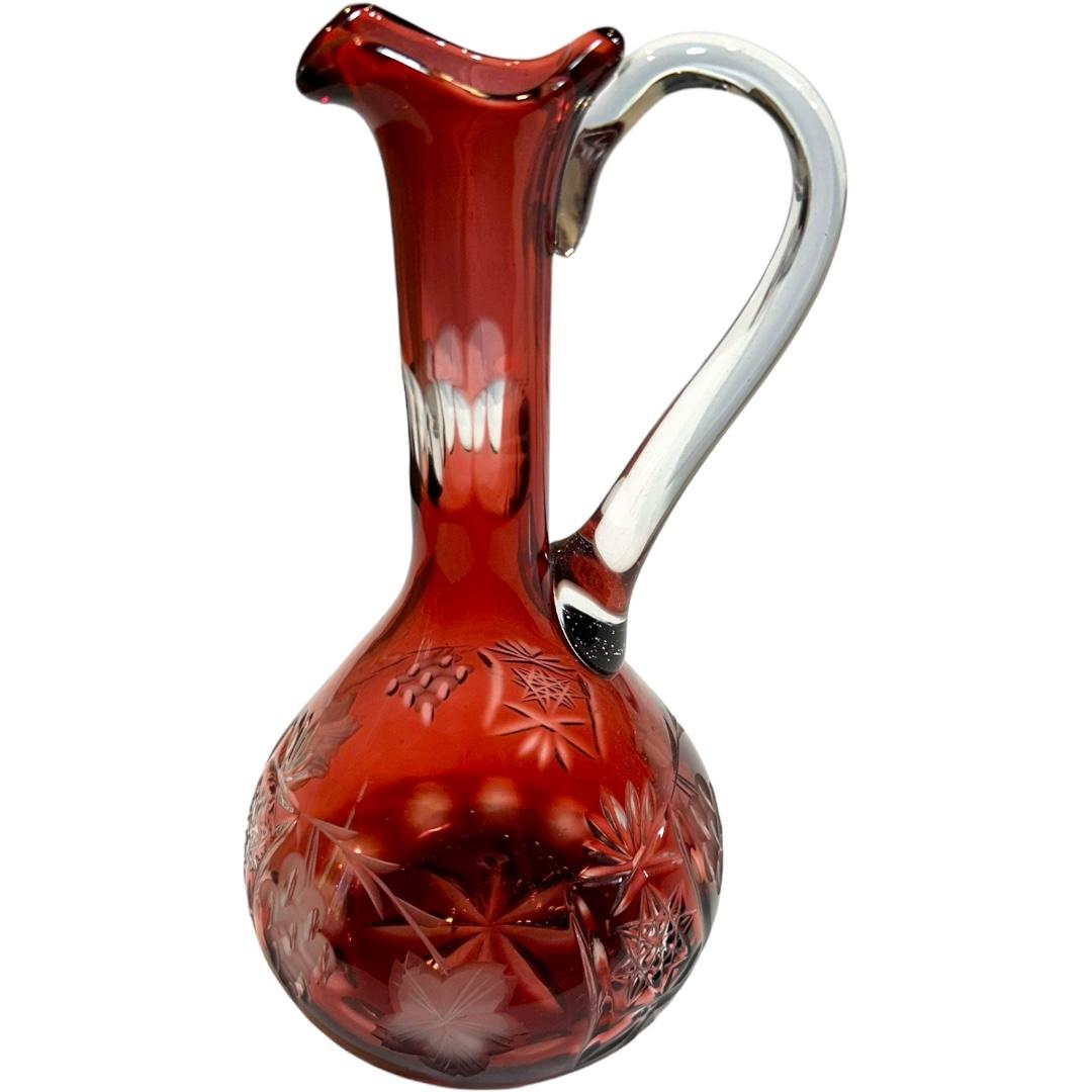 Add elegance to your barware collection with this vintage Nachtmann Bavarian crystal wine carafe.  Crafted from high-quality crystal material, this piece is a stunning addition to any collection.  The vibrant red color makes it perfect for any