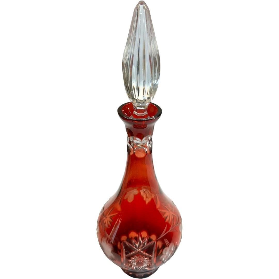 Add elegance to your barware collection with this vintage Nachtmann Bavarian crystal wine decanter.  Crafted from high-quality crystal material, this piece is a stunning addition to any collection.  The vibrant red color makes it perfect for any