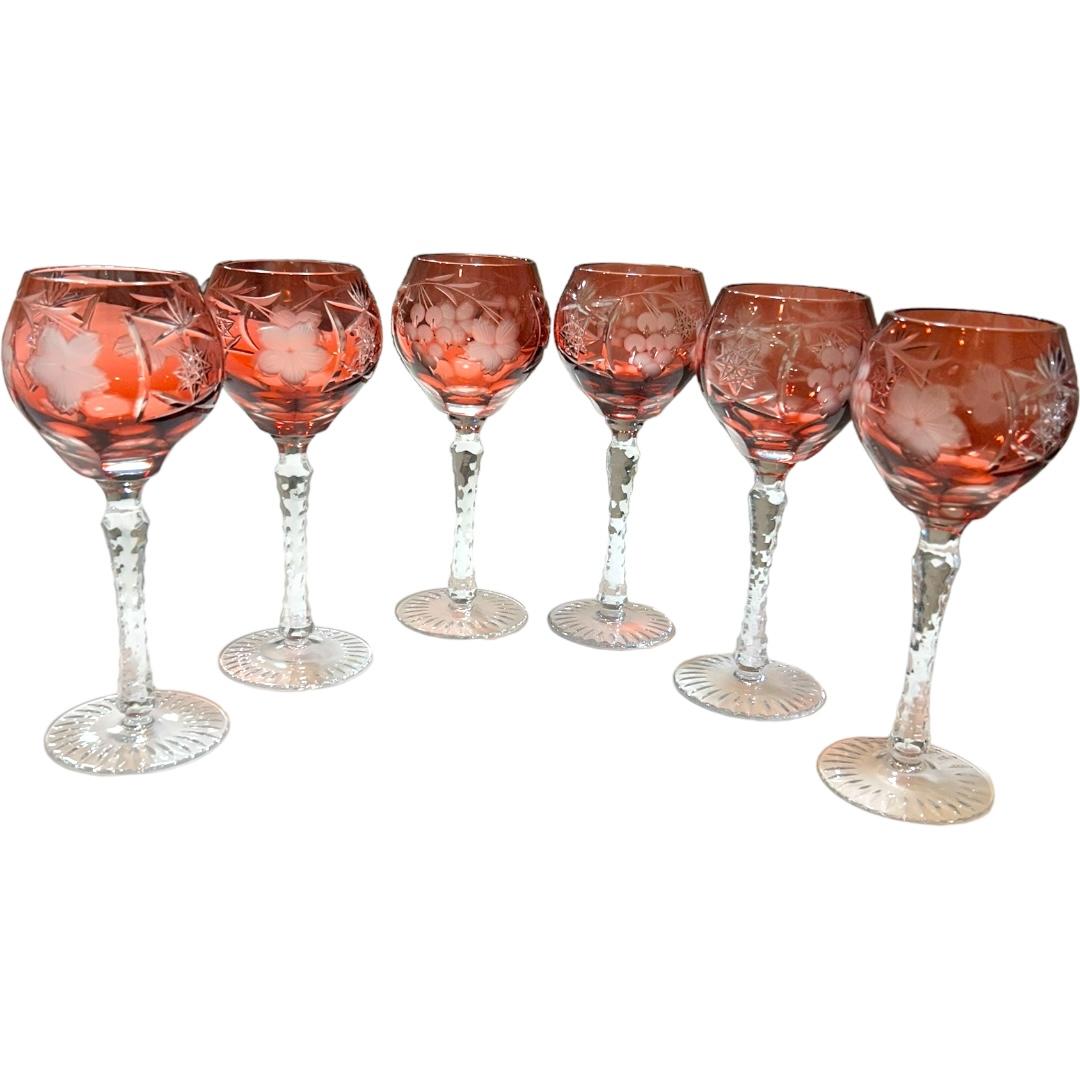 Add elegance to your barware collection with this vintage Nachtmann Bavarian crystal wine glasses (set of 6). Crafted from high-quality crystal material, these glasses are a stunning addition to any collection.  The vibrant red color makes it