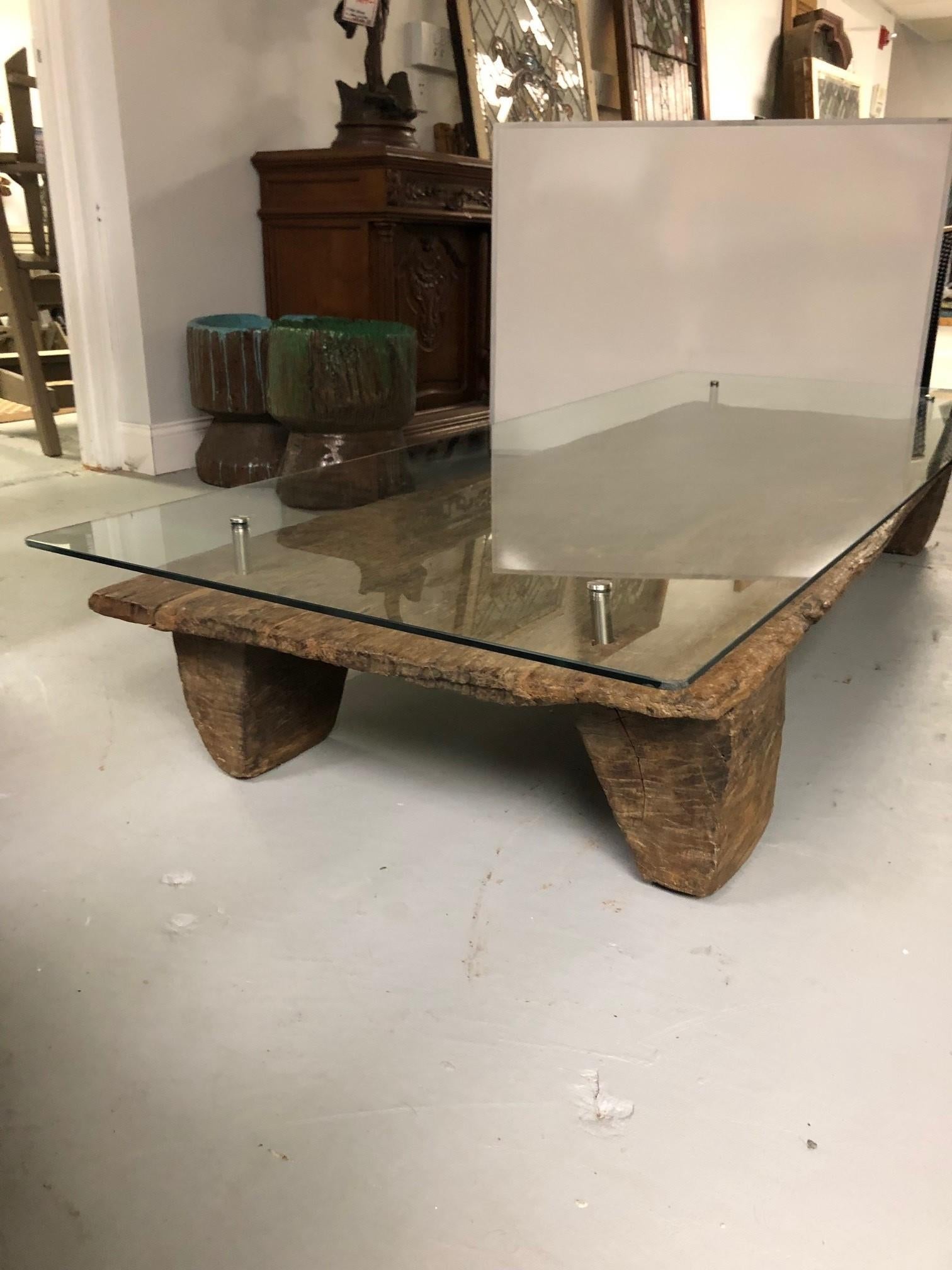 Carved Vintage Nagaland Tribal Bed Coffee Table with a Glass Top For Sale