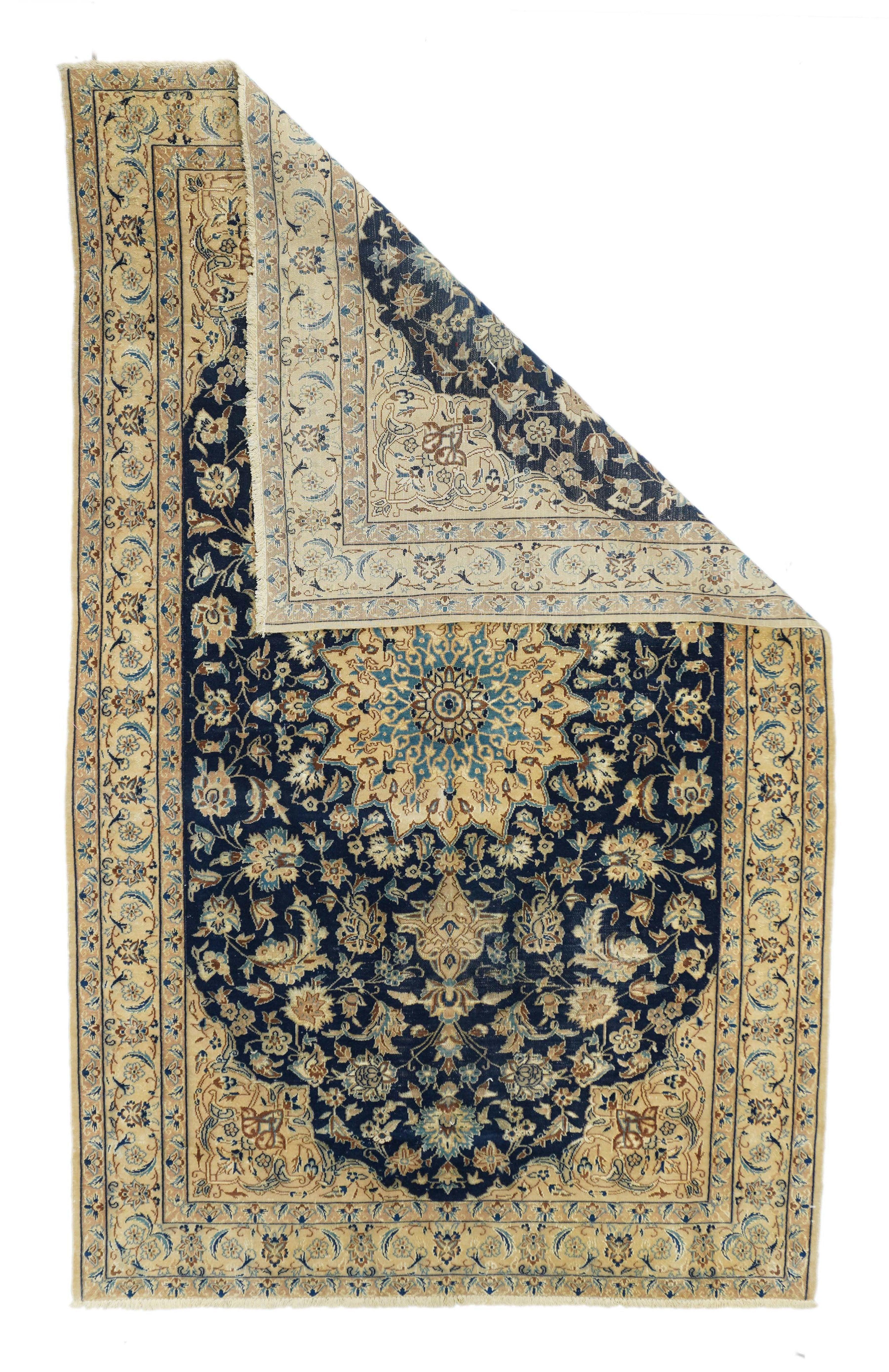 Vintage Nain Rug 4'5'' x 7'4''. A finely knotted central Persian city scatter at a very reasonable price! The navy field centres a round straw 16-point medallion with escutcheon pendants, and a medium blue conformal sub-medallion. The palmettes and