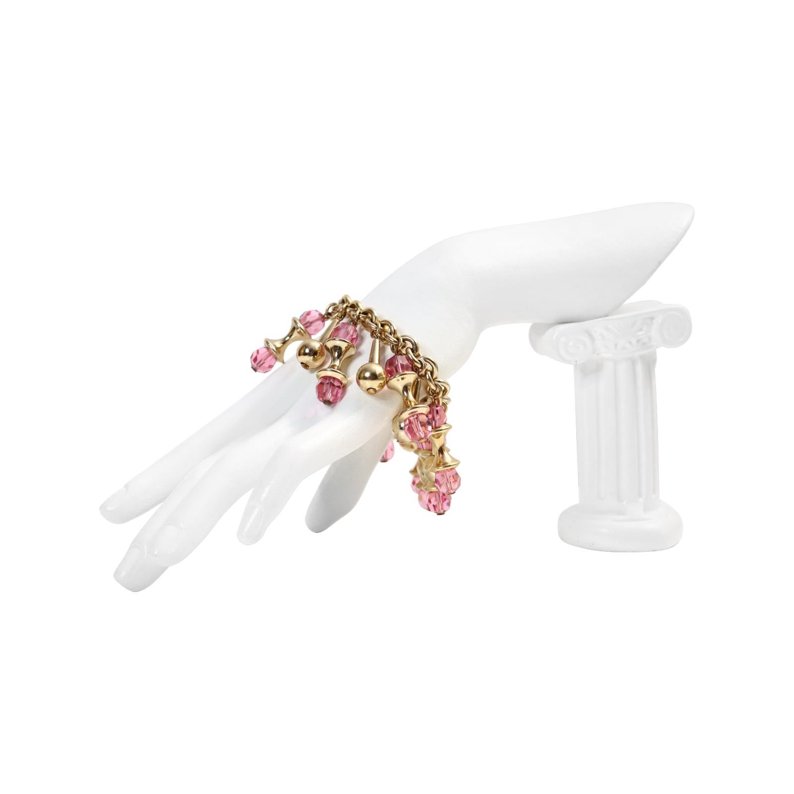 Modern Vintage Napier Gold Tone Dangling Pink Bracelet Circa 1960s