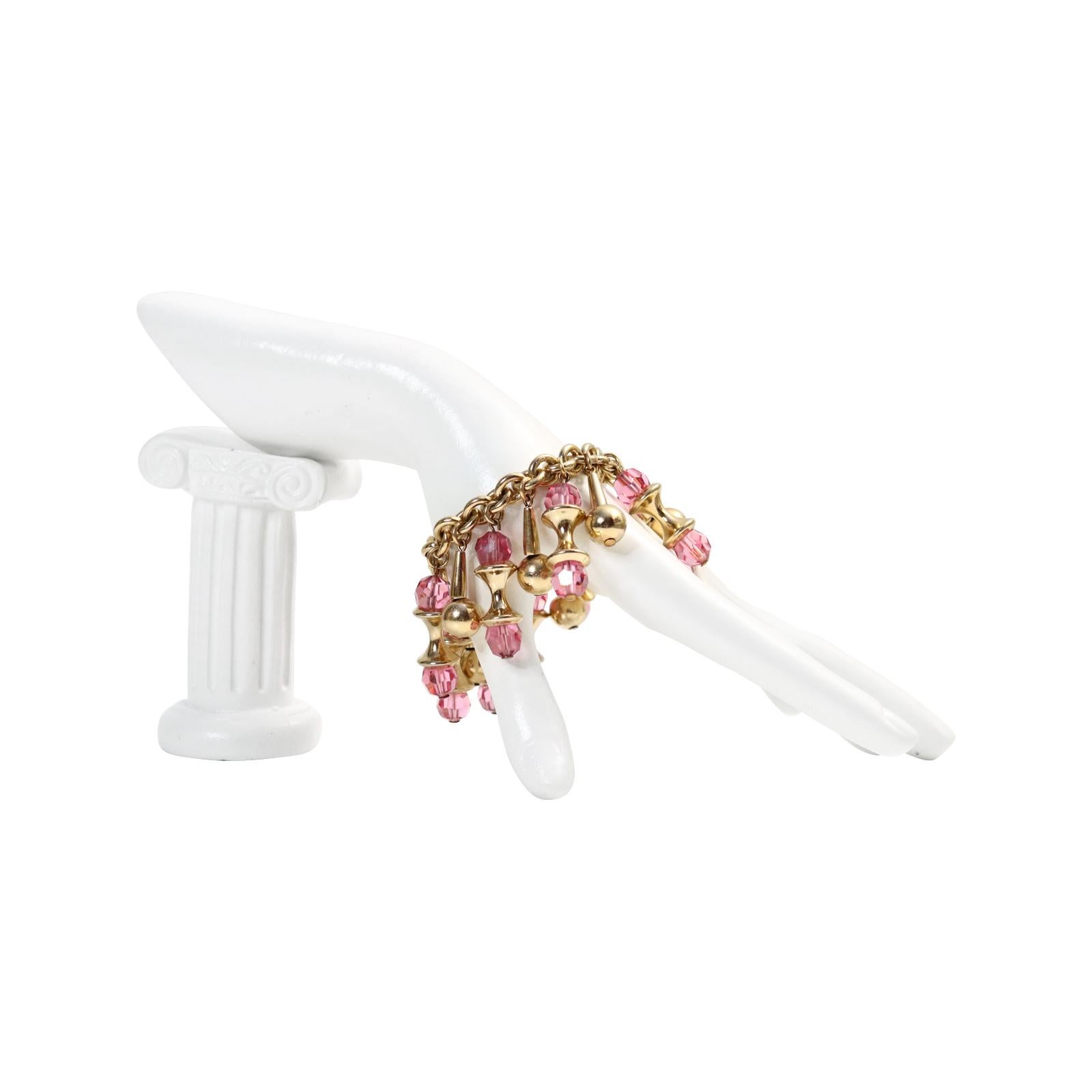 Vintage Napier Gold Tone Dangling Pink Bracelet Circa 1960s In Good Condition In New York, NY