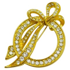 Vintage NAPIER signed gold tone rhinestone bow designer brooch